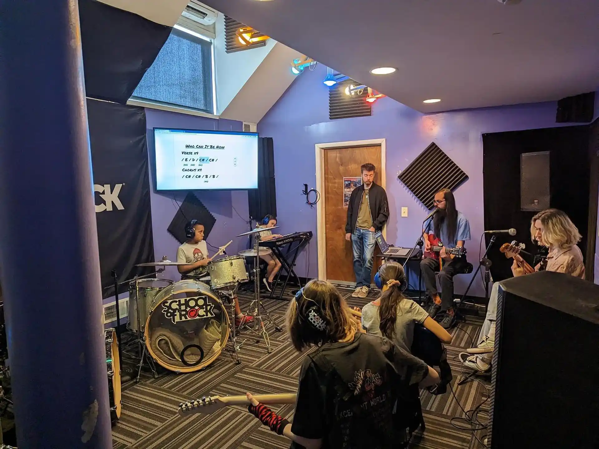 a group of people playing instruments