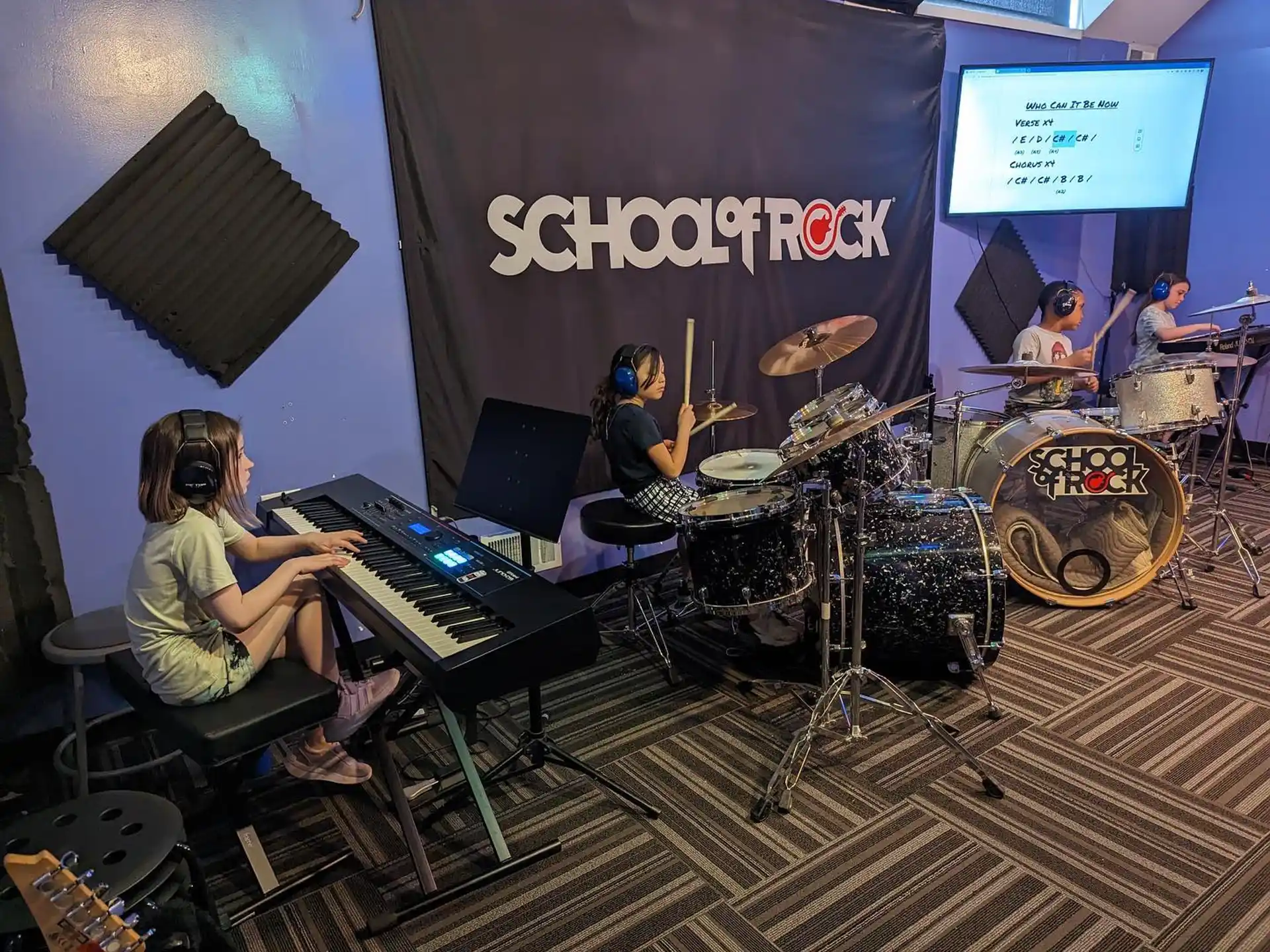a group of people playing instruments