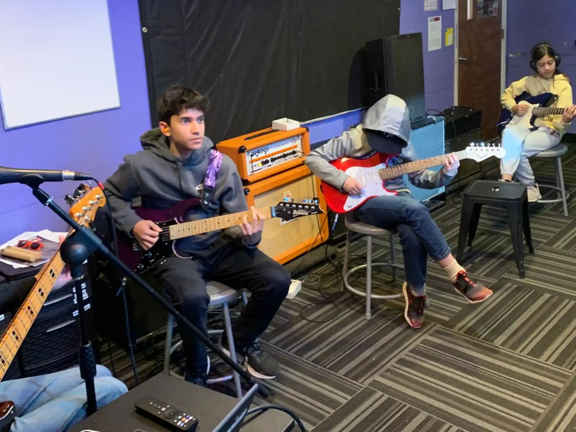 a group of people playing instruments