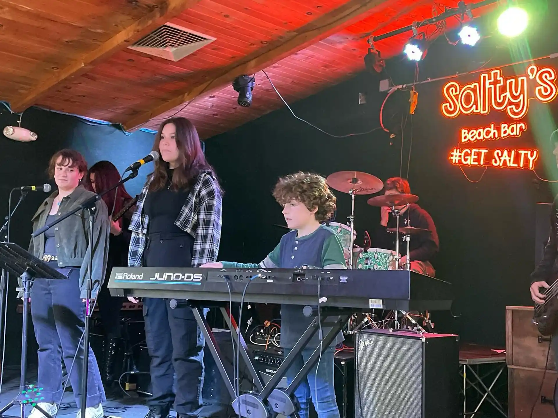 a group of people playing musical instruments