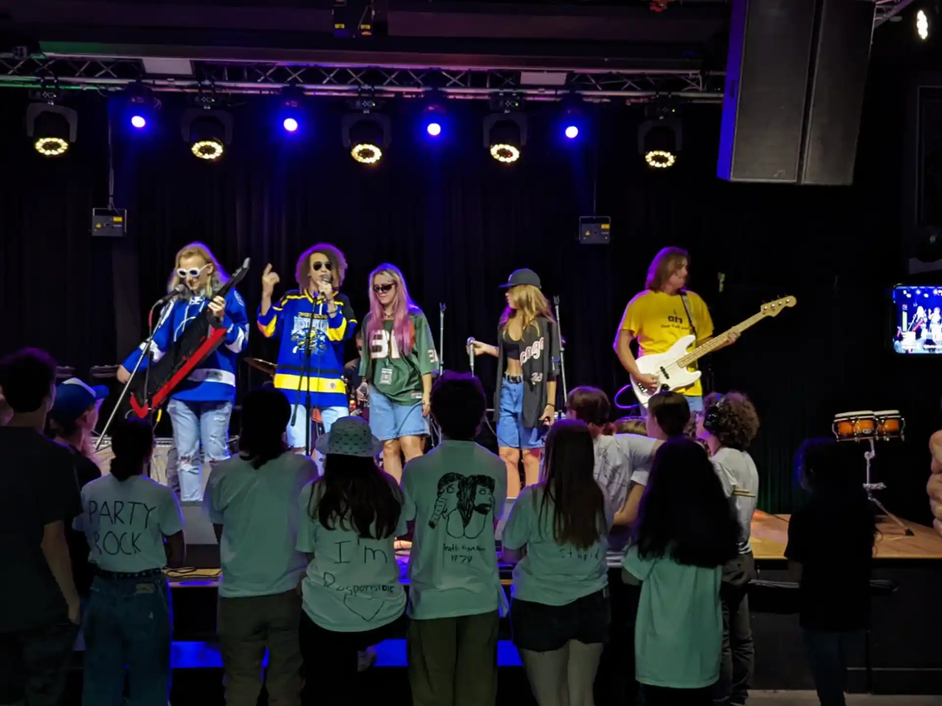a group of people on a stage