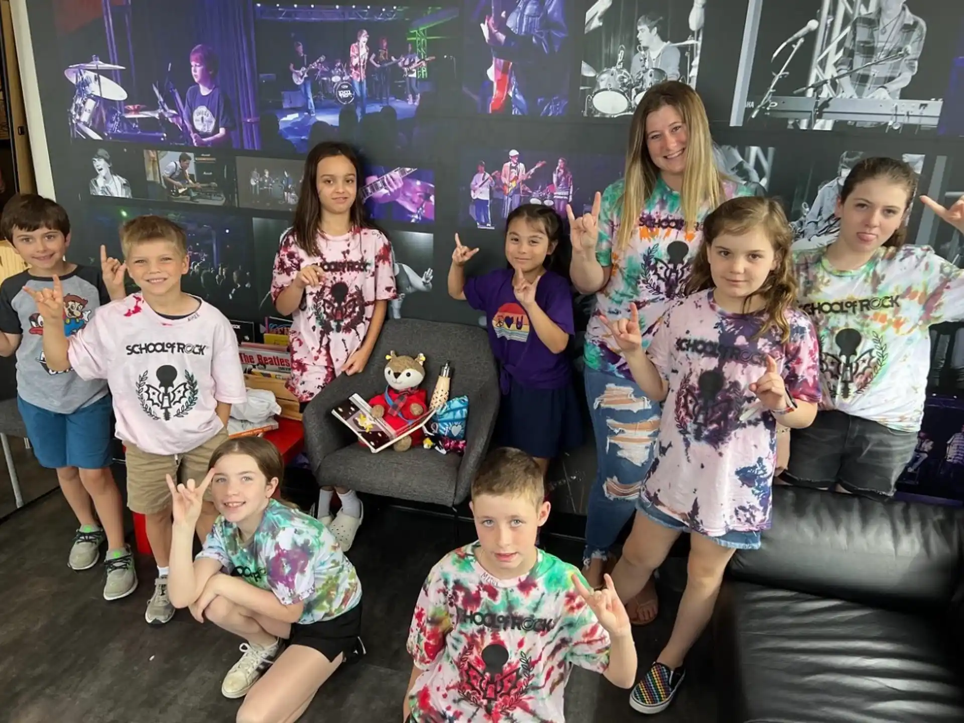 a group of children posing for a photo