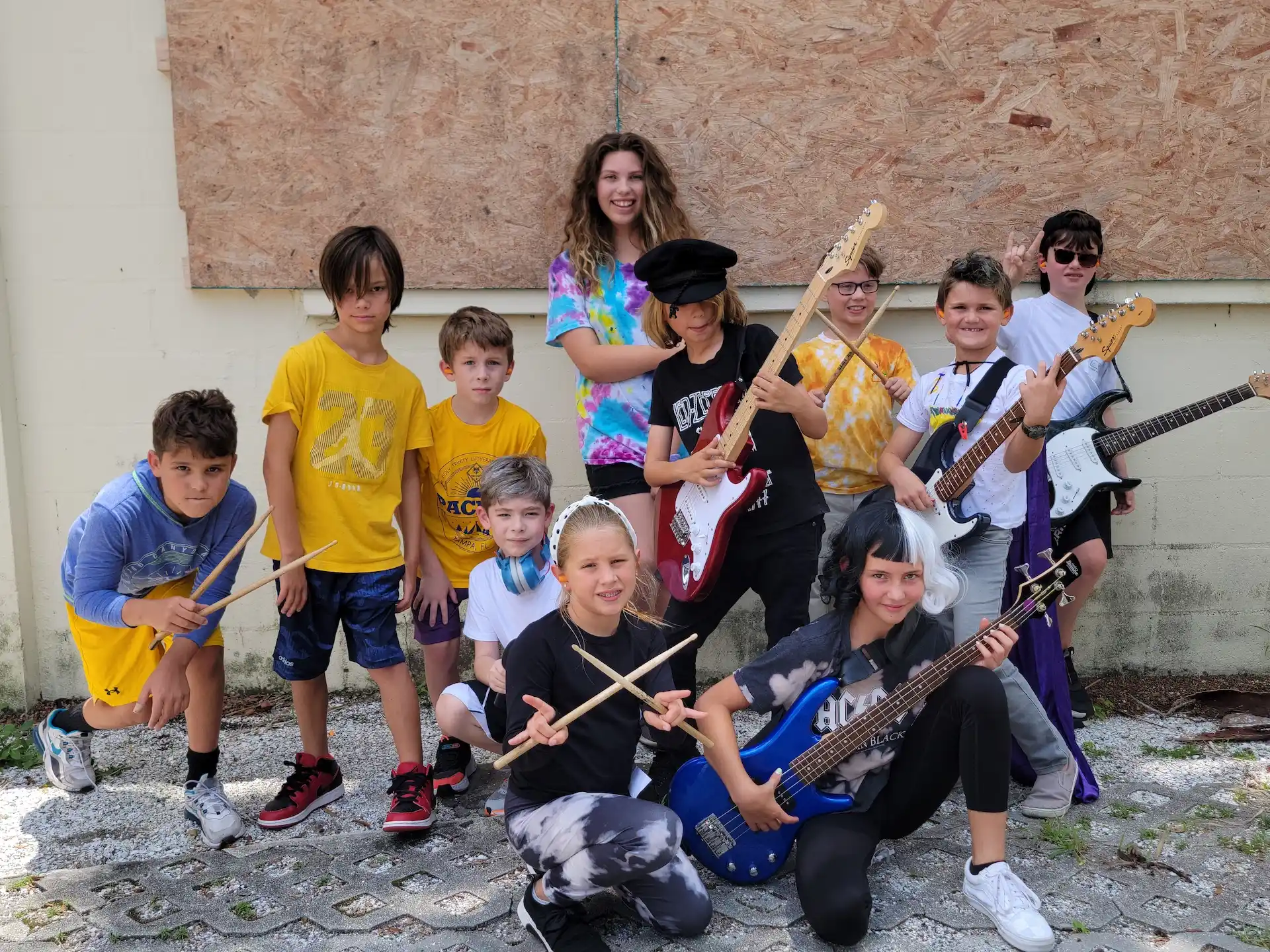 a group of people holding instruments