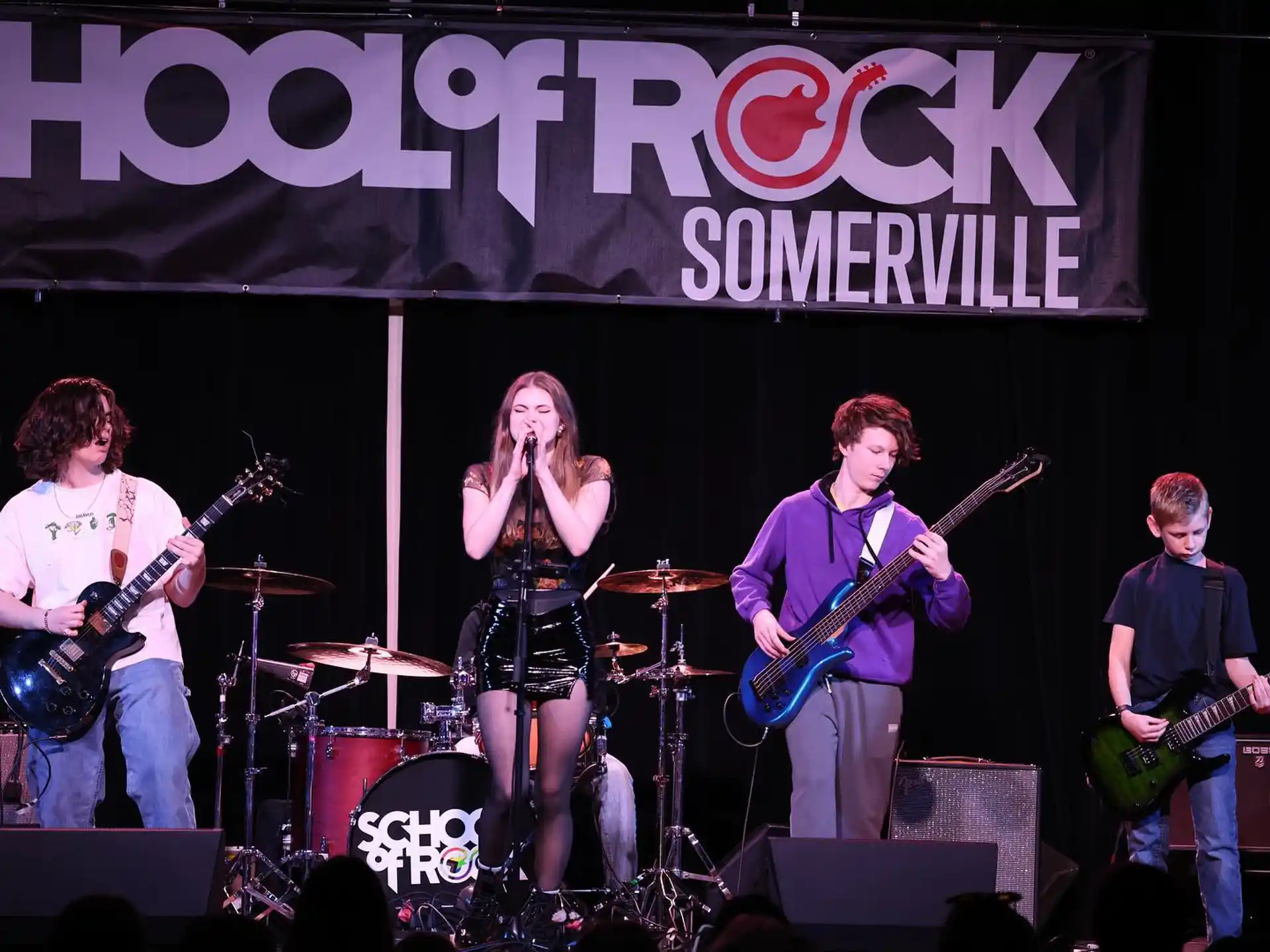 a group of people on a stage
