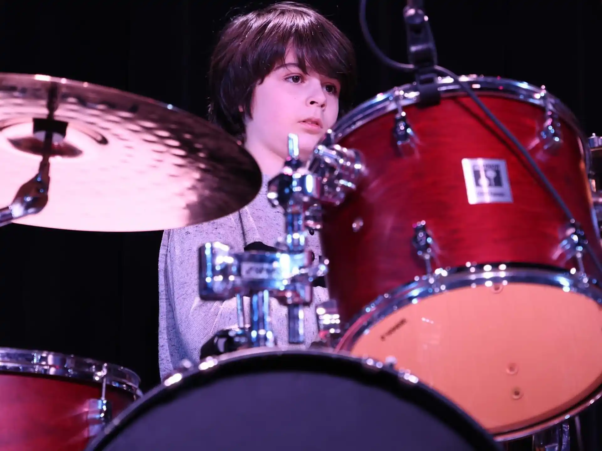 a person playing a drum set
