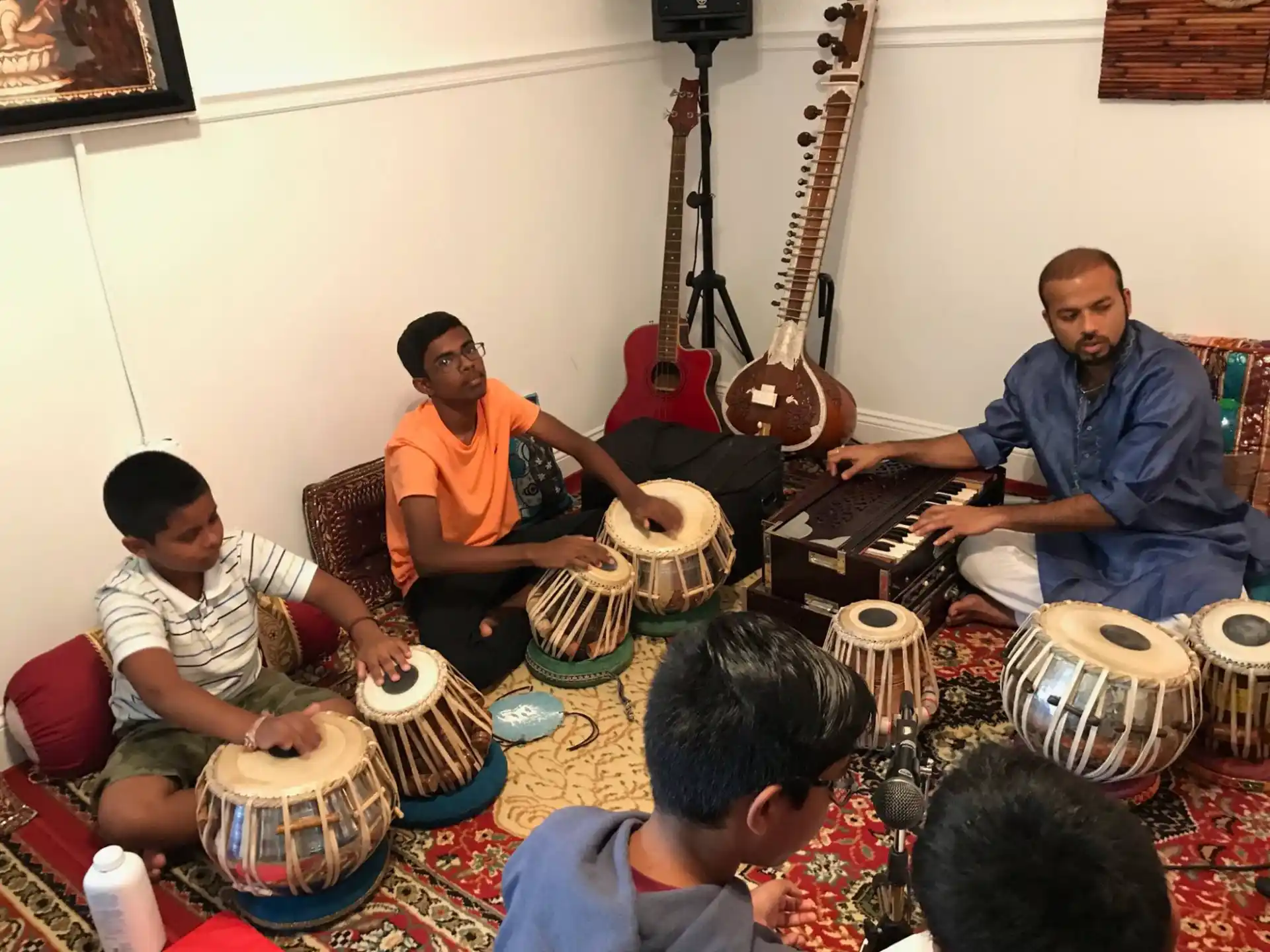 a group of people playing instruments