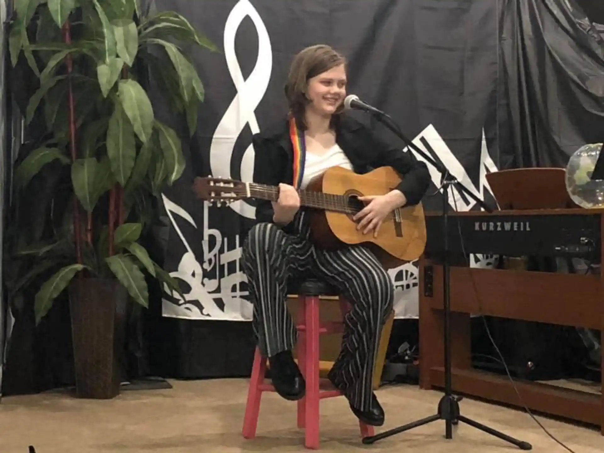 a person playing a guitar