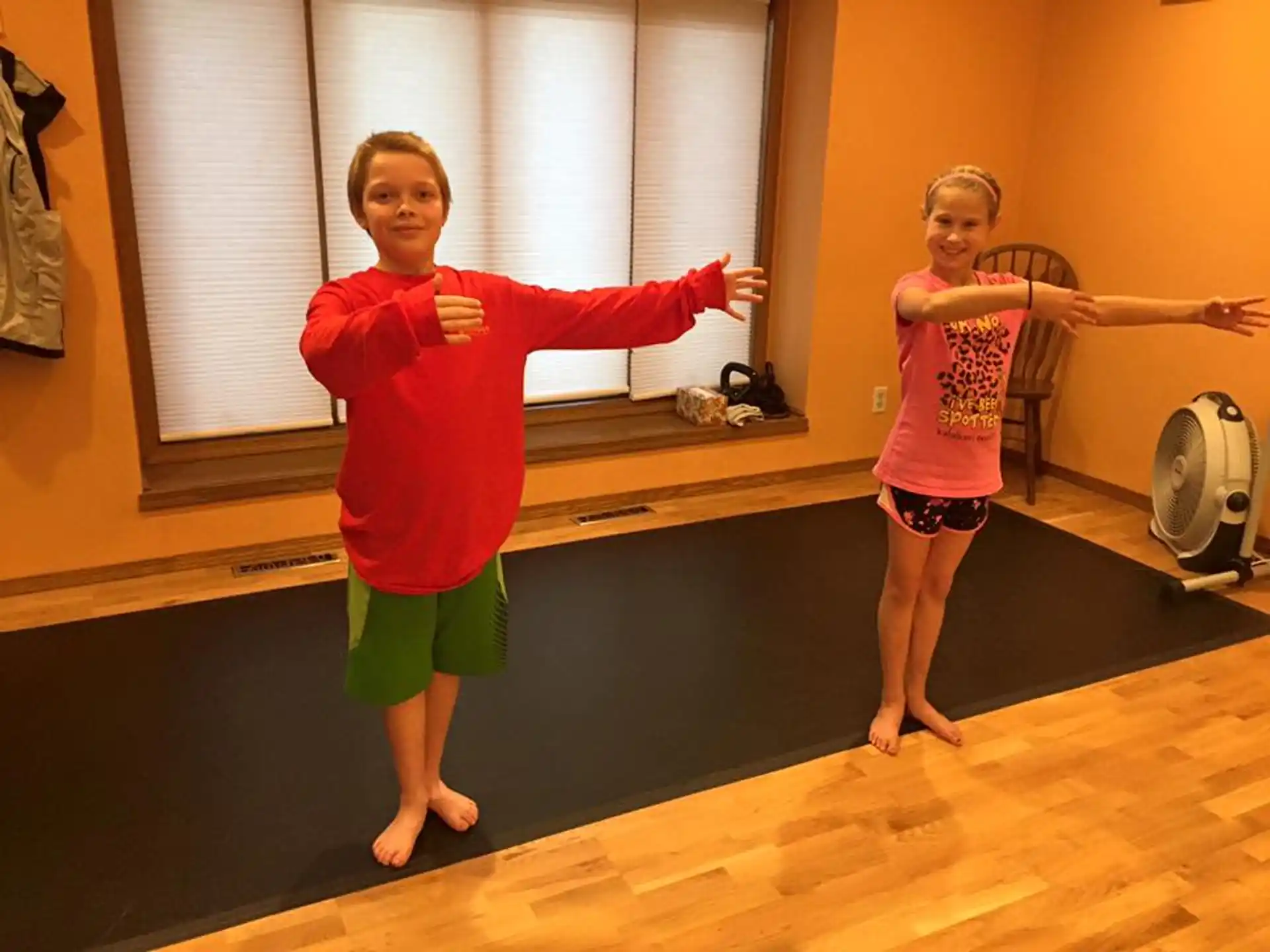a couple of children posing for the camera