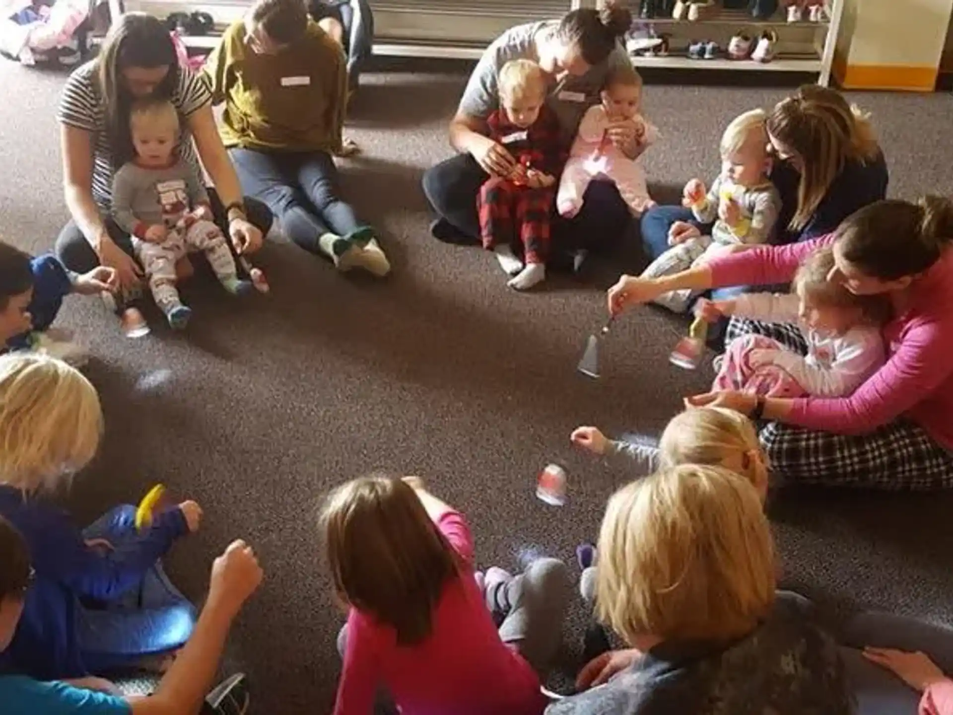 a group of children sitting on the floor
