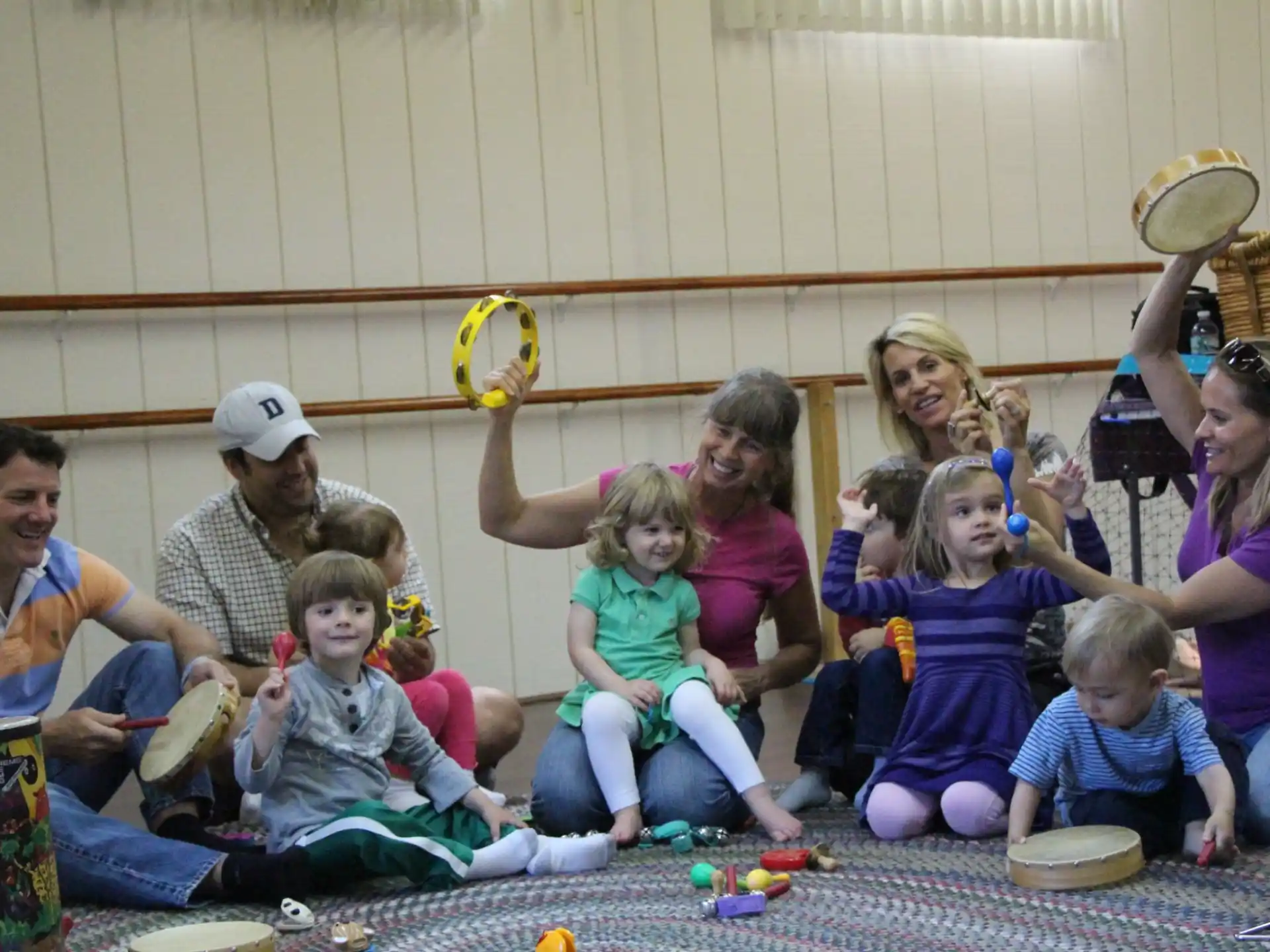 a group of people sitting on the ground