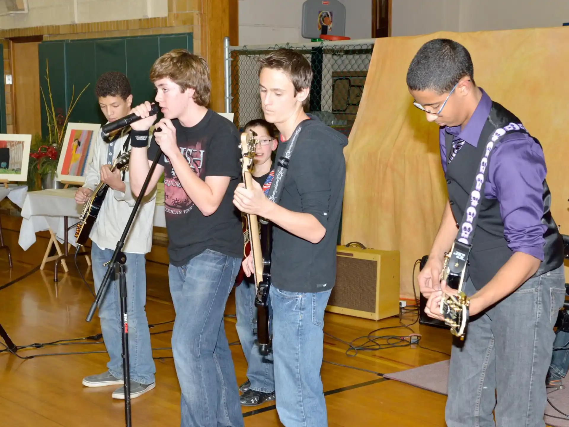 a group of boys playing instruments