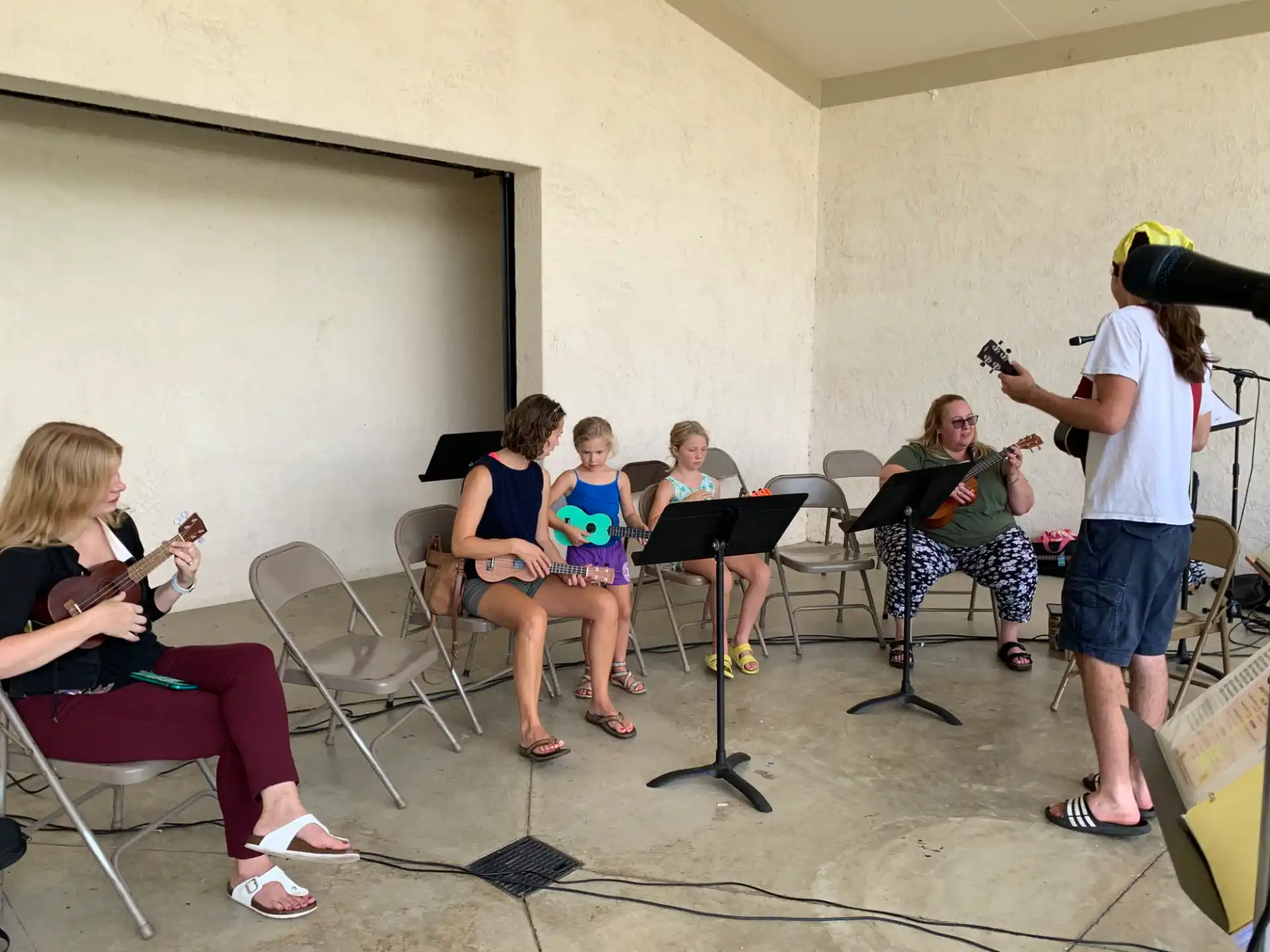 a group of people sitting in chairs