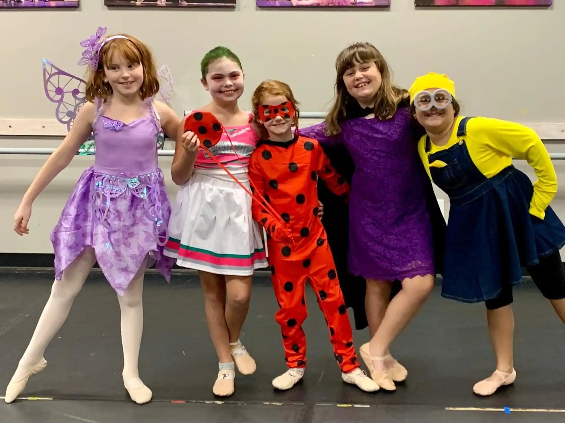a group of girls wearing clothing