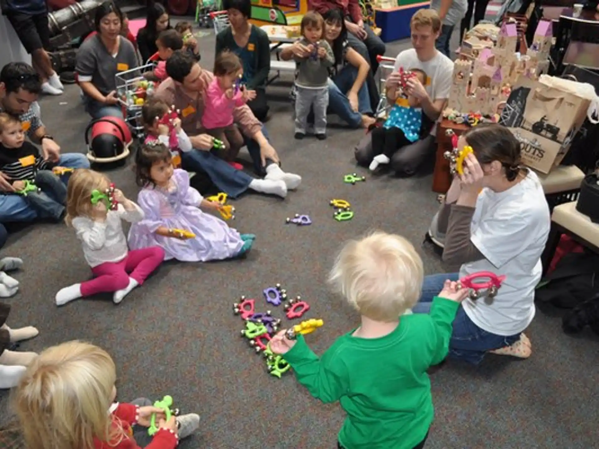 a group of children sitting on the floor