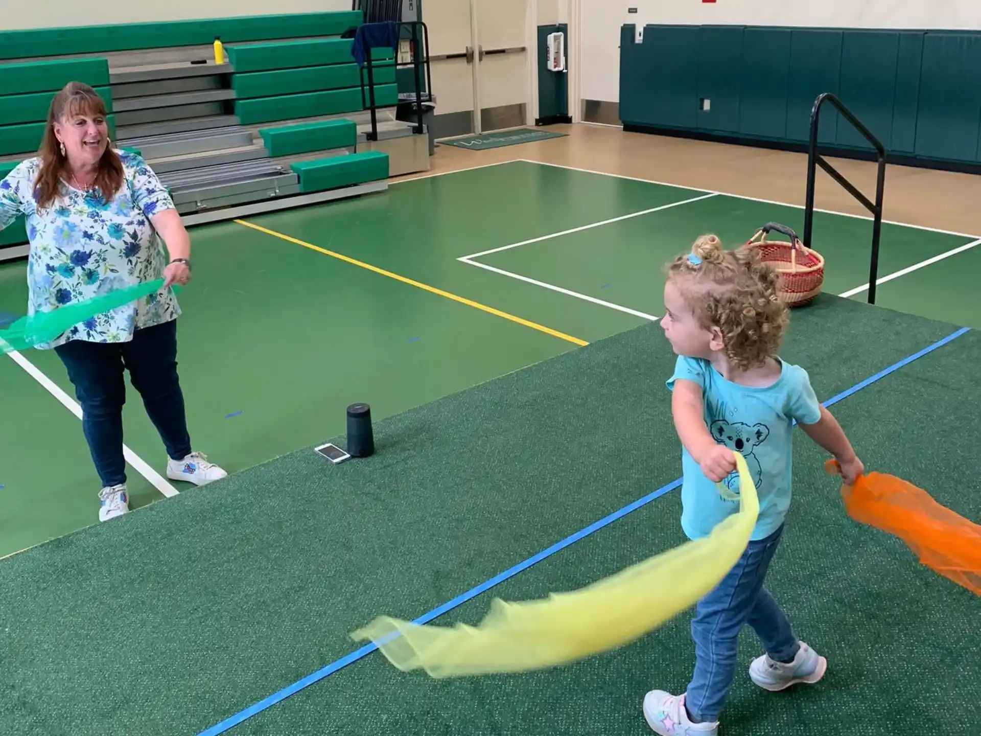 a girl holding a basket and a girl holding a basket