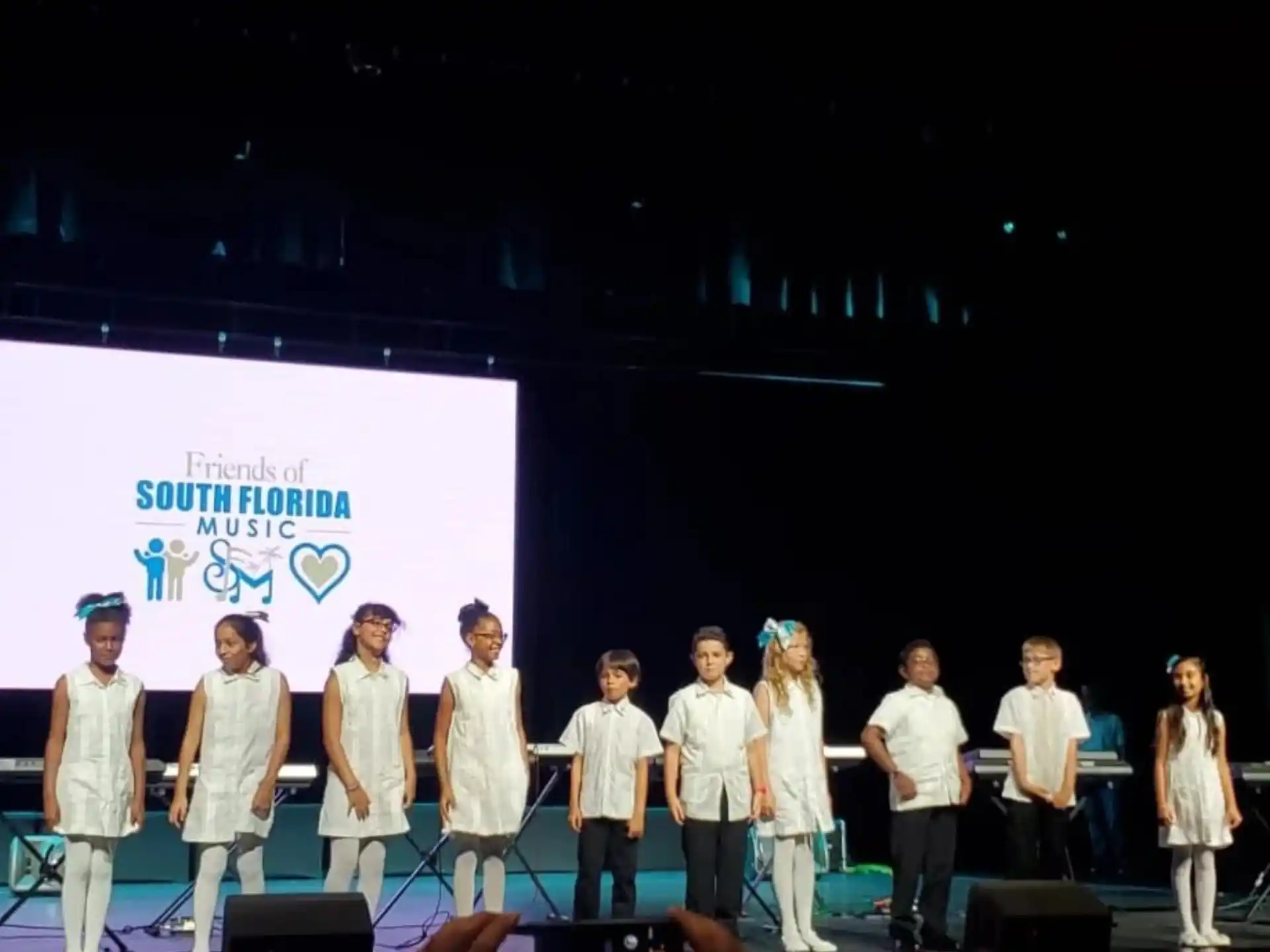 a group of people on a stage