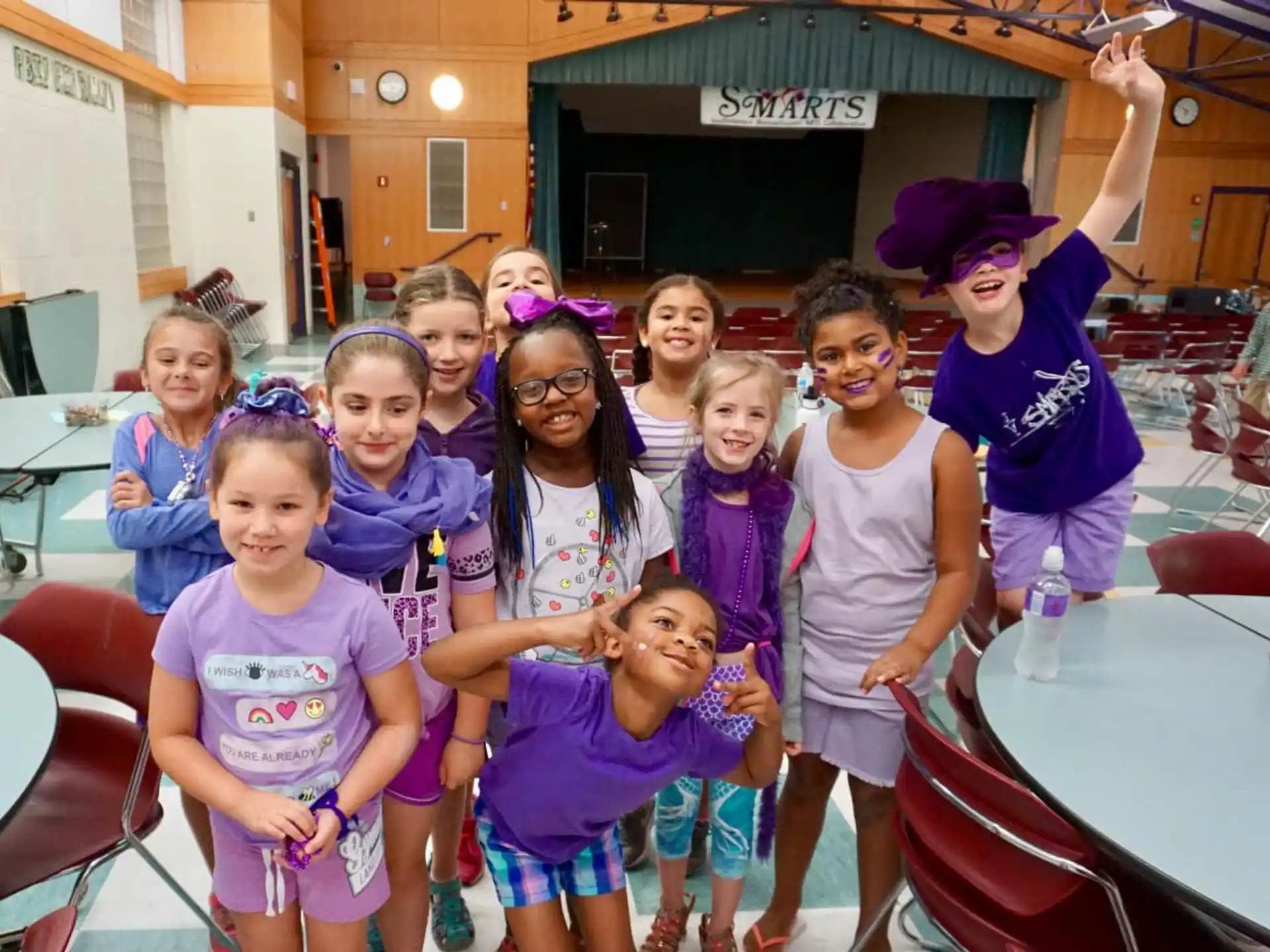 a group of children posing for a photo