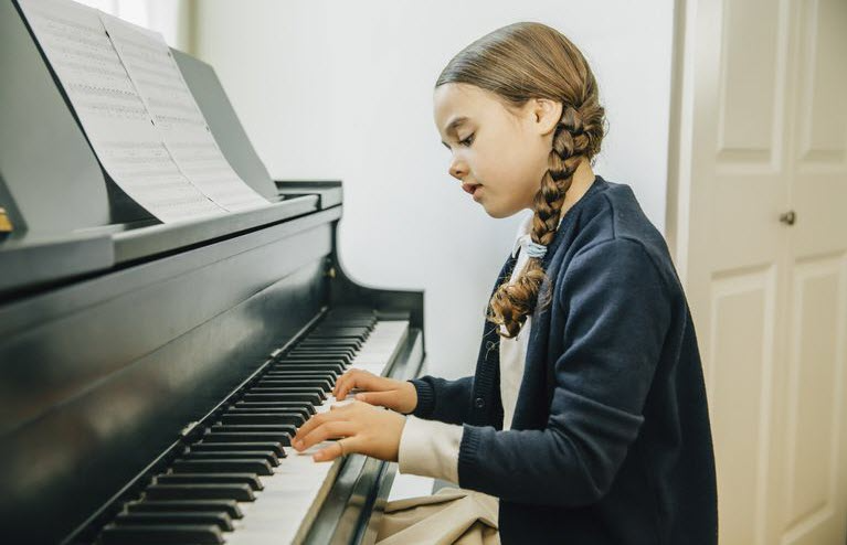 a person playing a piano
