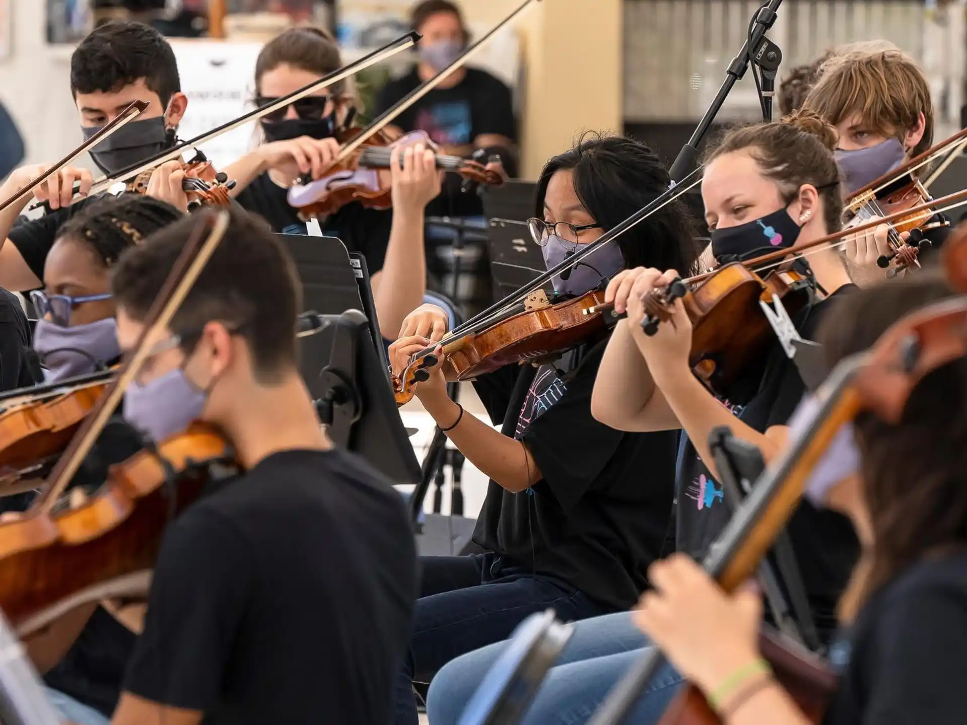 a group of people playing instruments