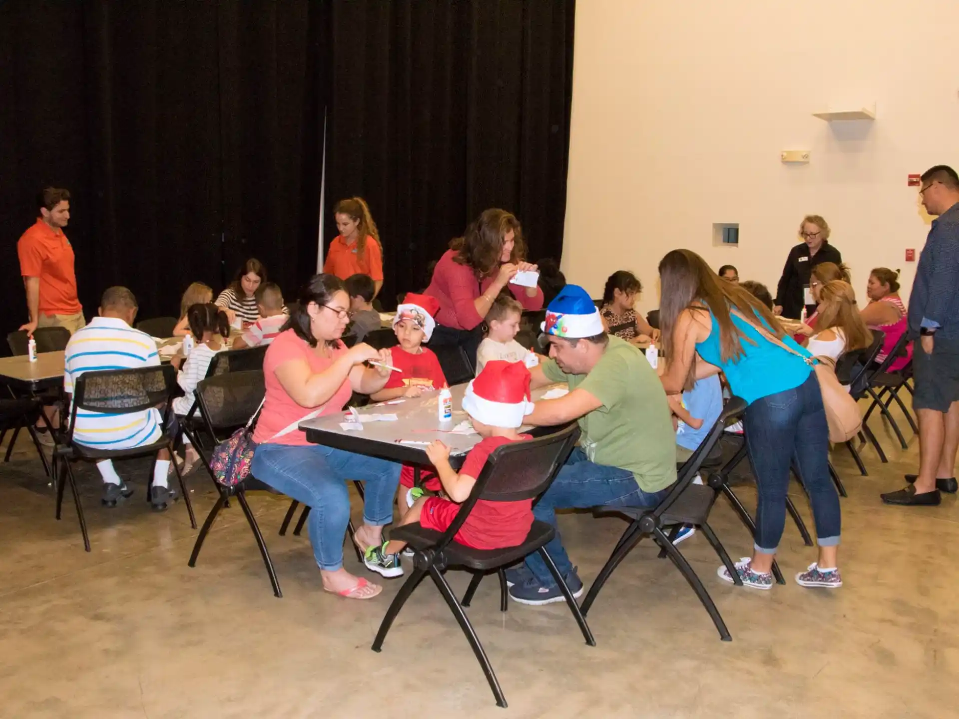 a group of people sitting around a table