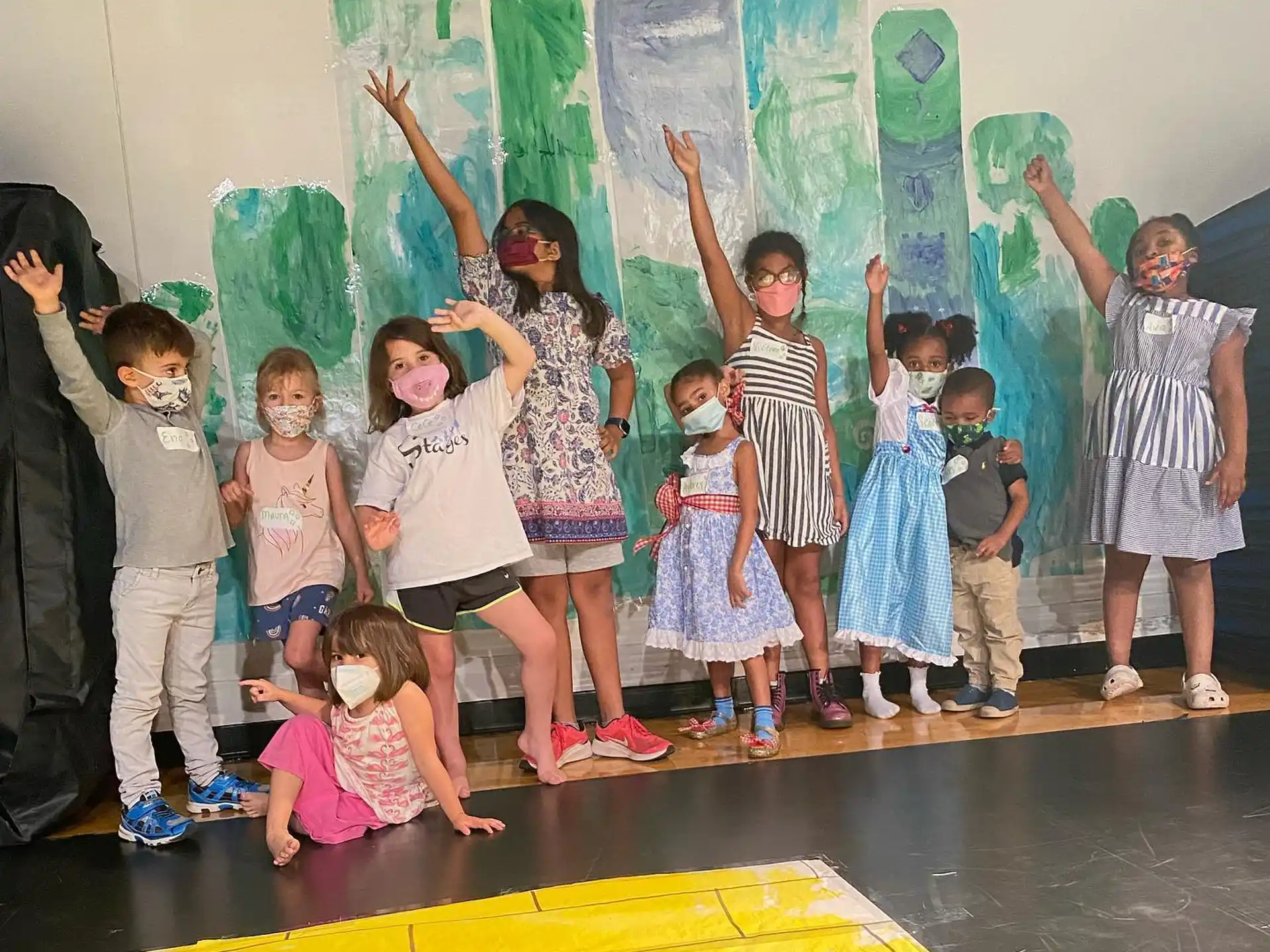 a group of children posing for a photo