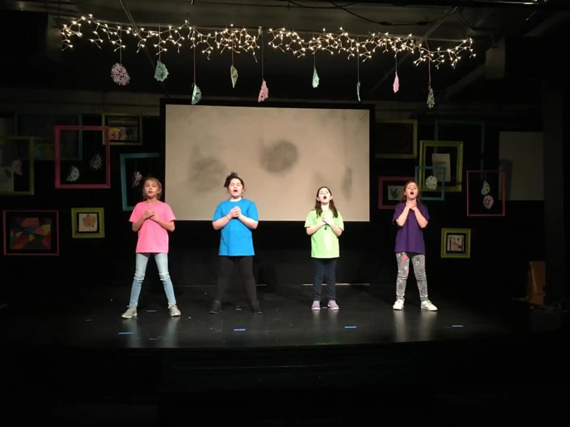 a group of women on a stage
