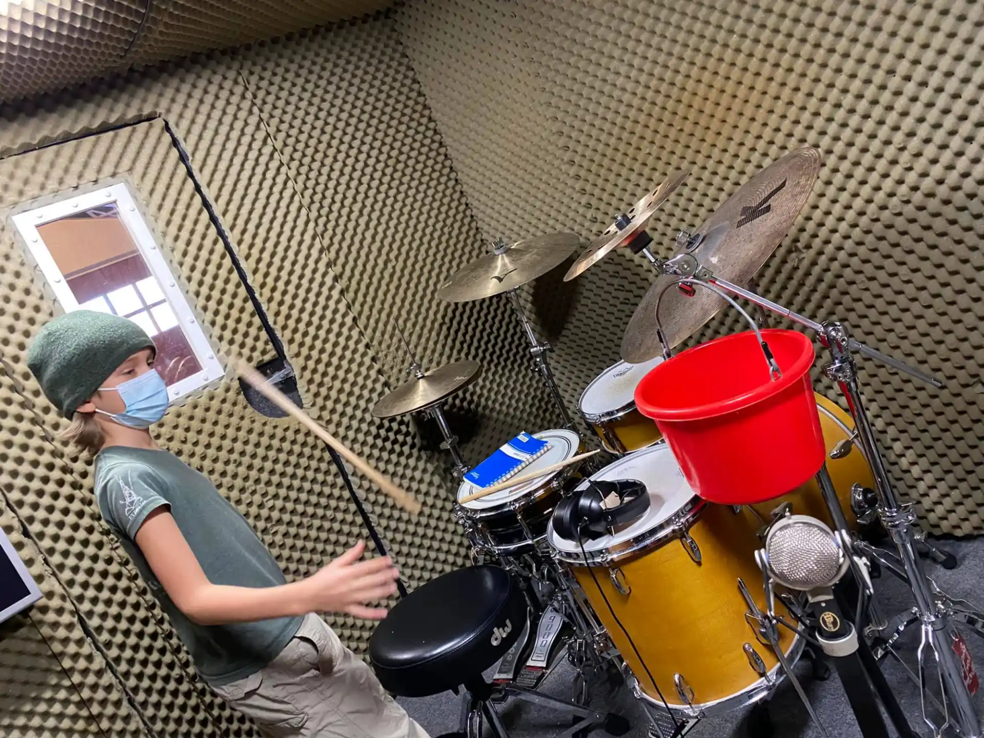 a person playing a drum set