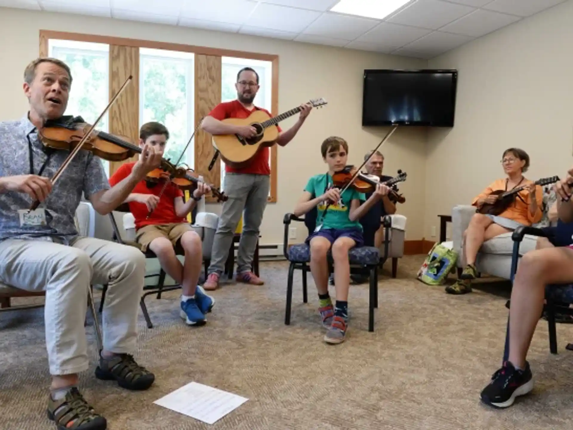 a group of people playing instruments