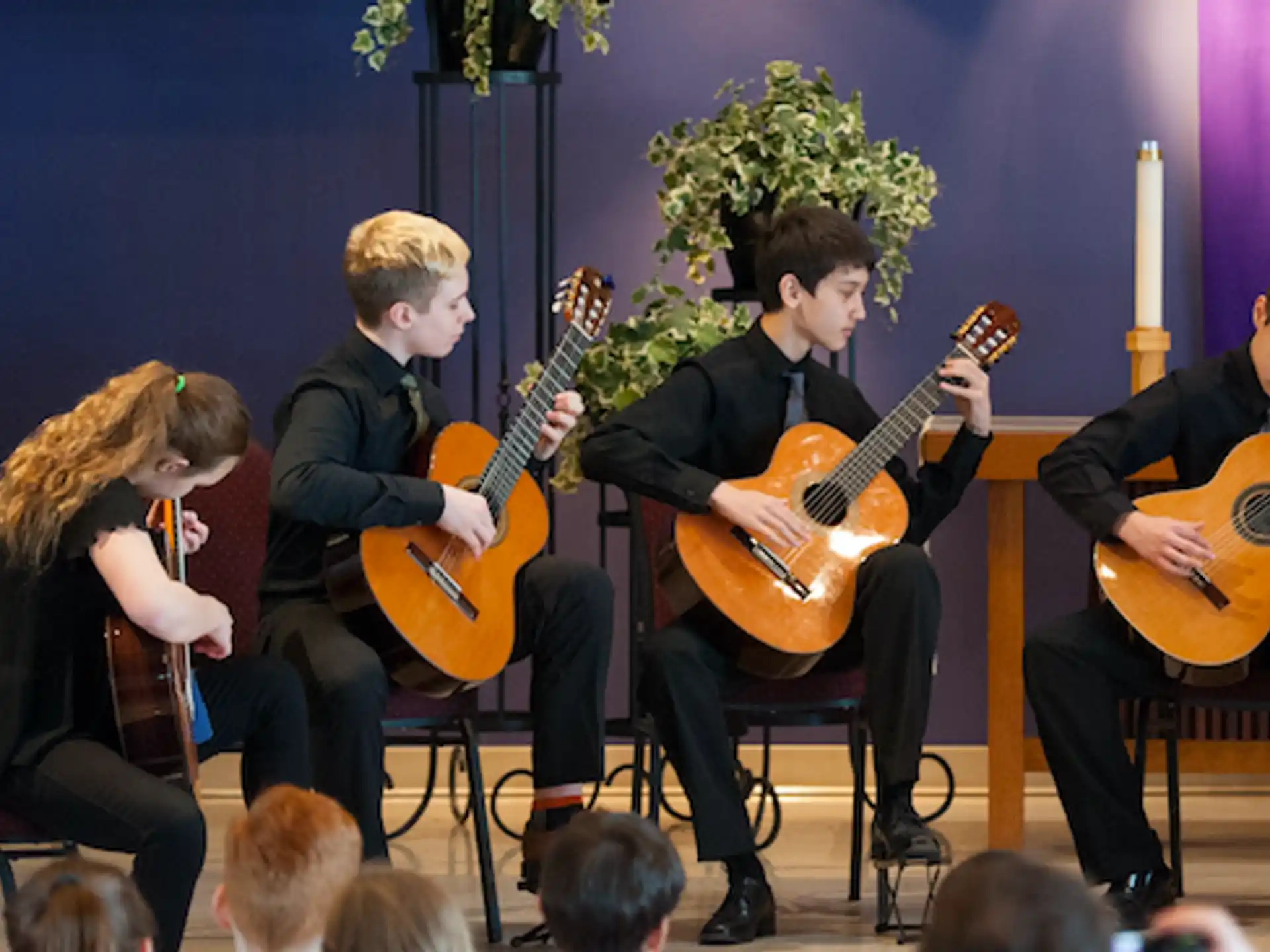 a group of people playing instruments