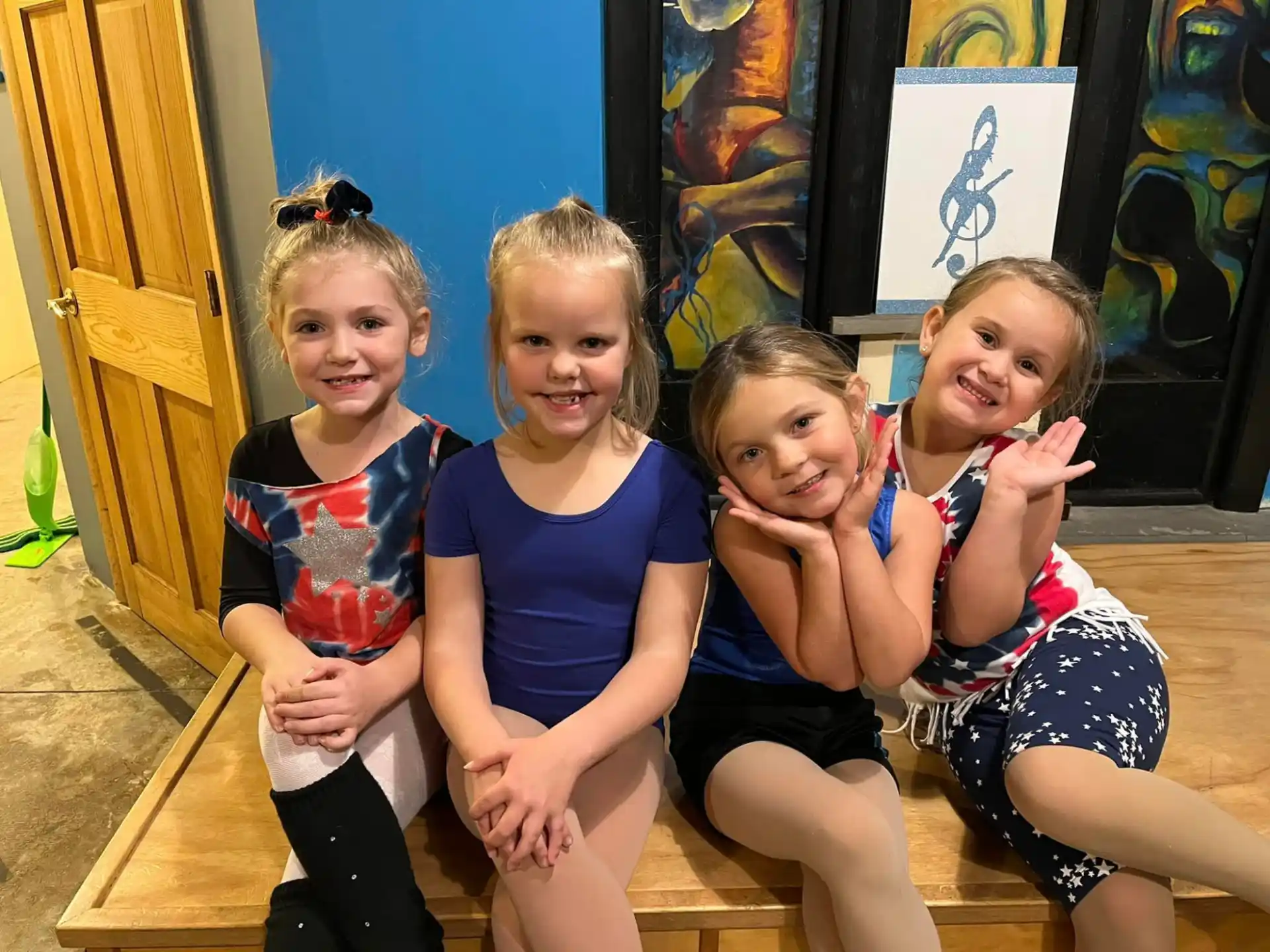 a group of girls posing for a picture