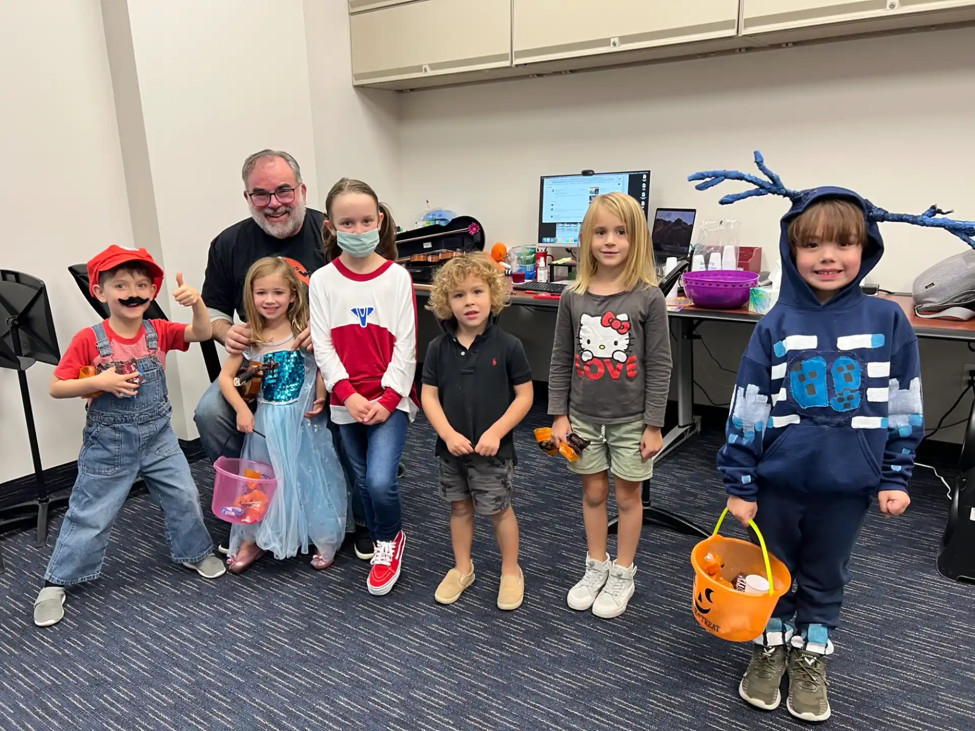 a group of children posing for a photo