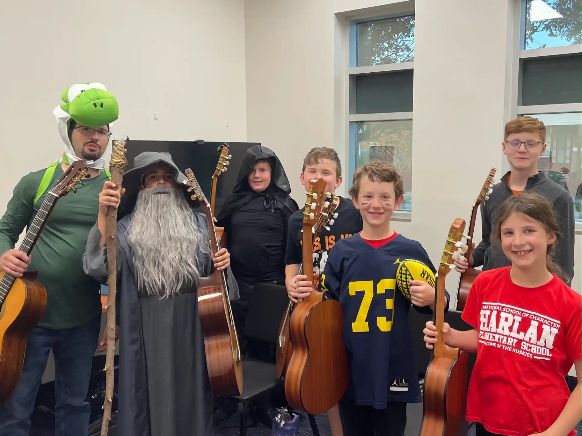 a group of people holding instruments
