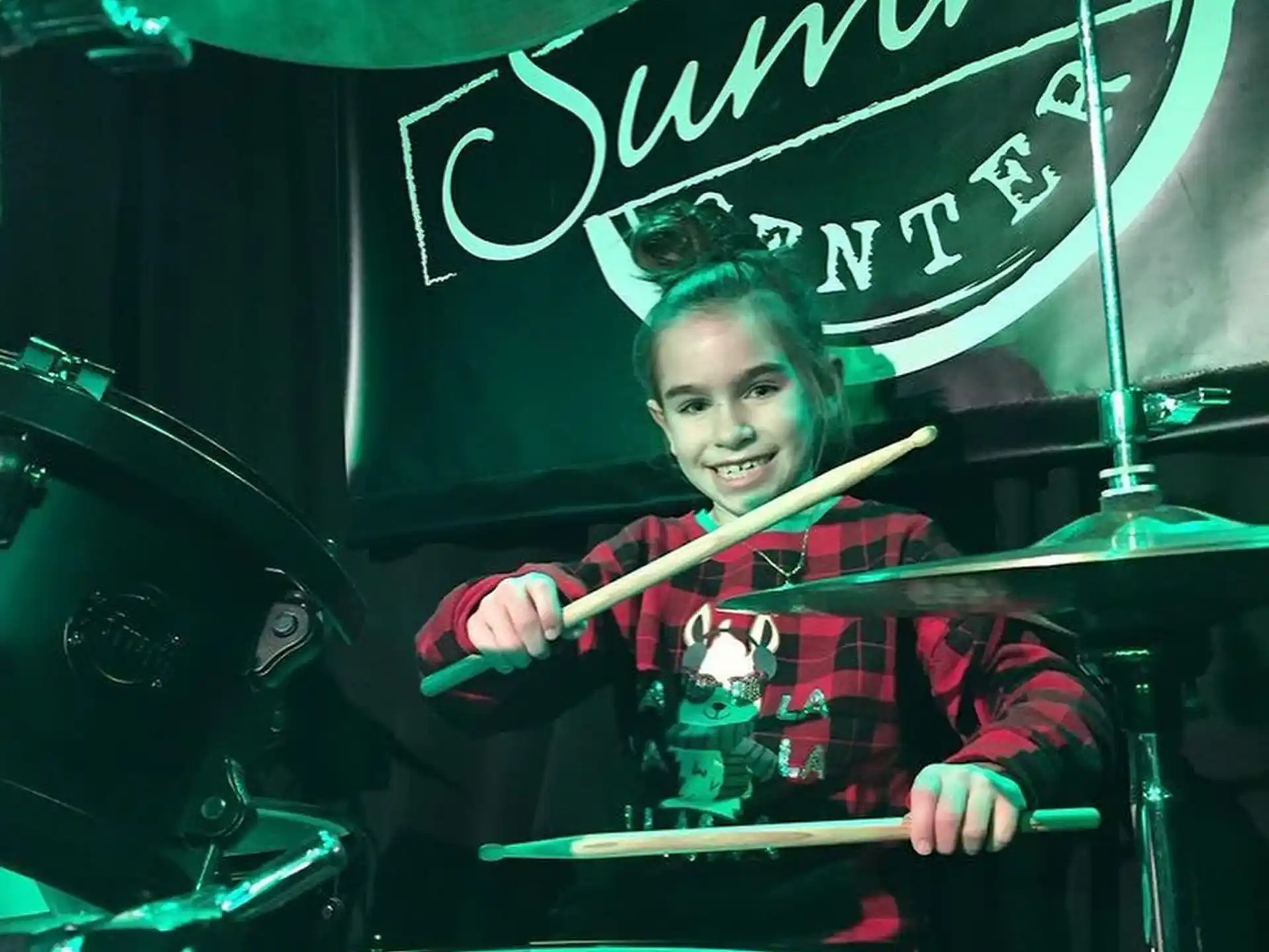 a person playing drums