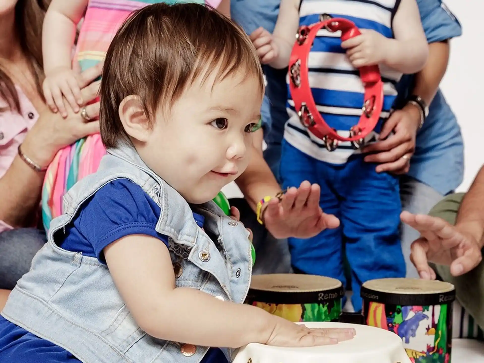 a child sitting in a crowd