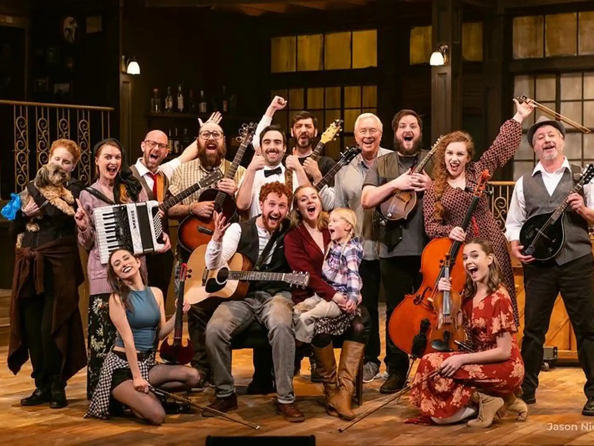 a group of people holding musical instruments
