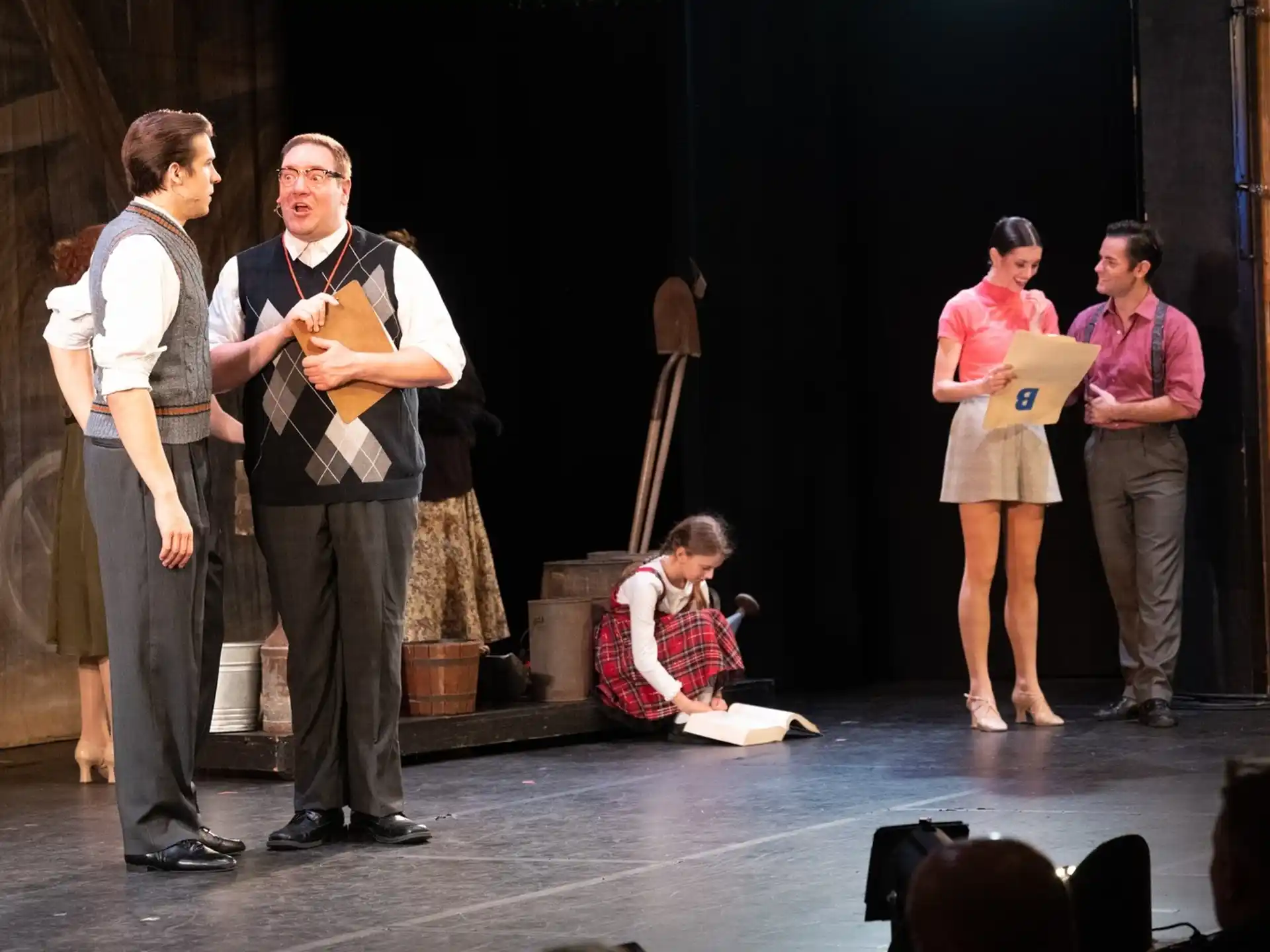 a group of people on a stage