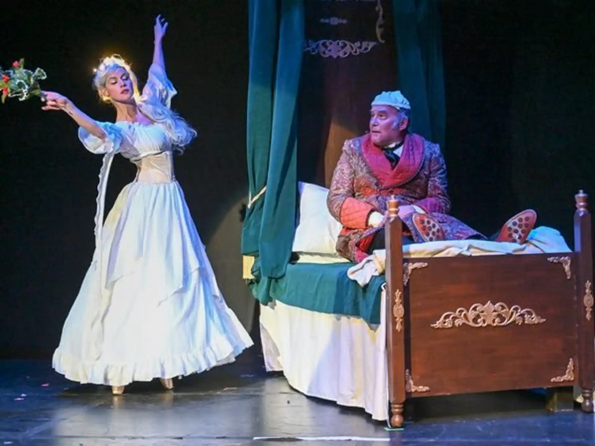 a man and woman on a stage