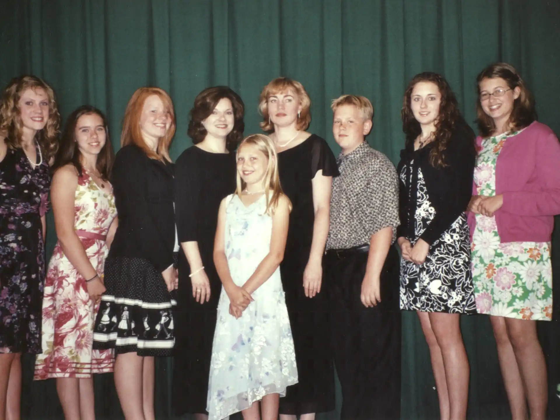 a group of people posing for a photo