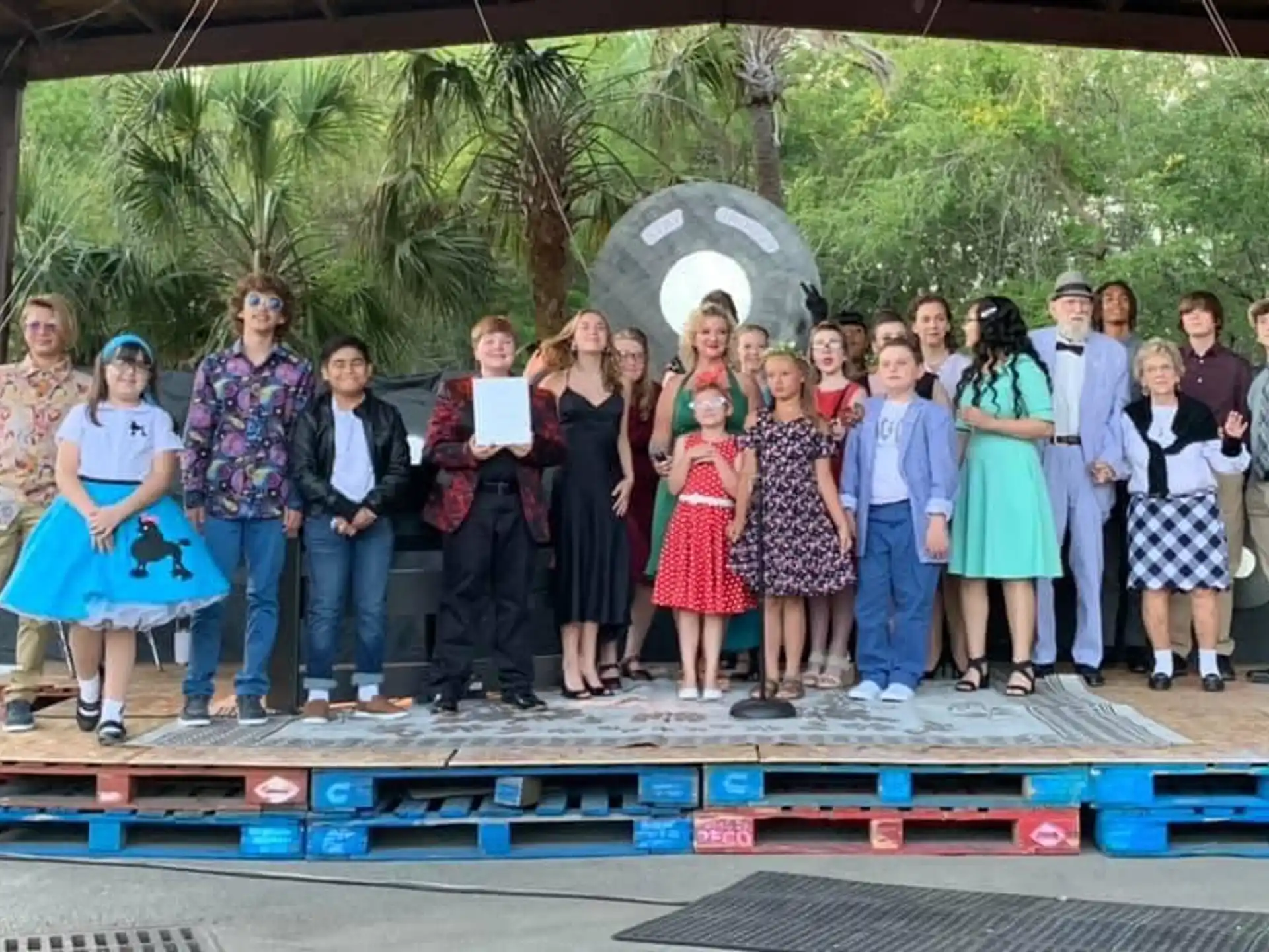 a group of people standing on a stage