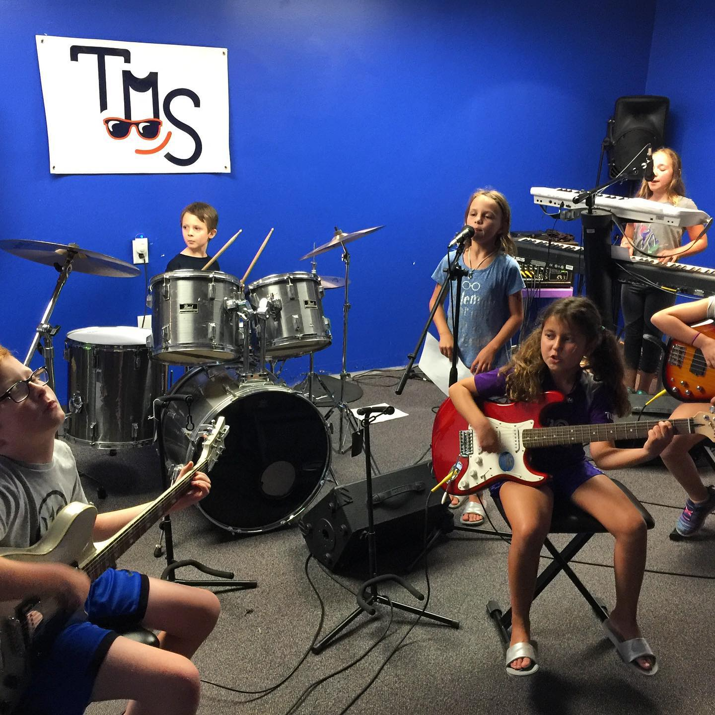 a group of people playing instruments