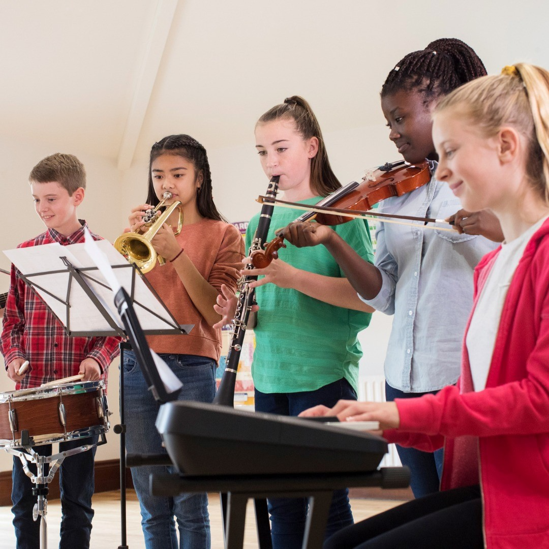 a group of people playing instruments