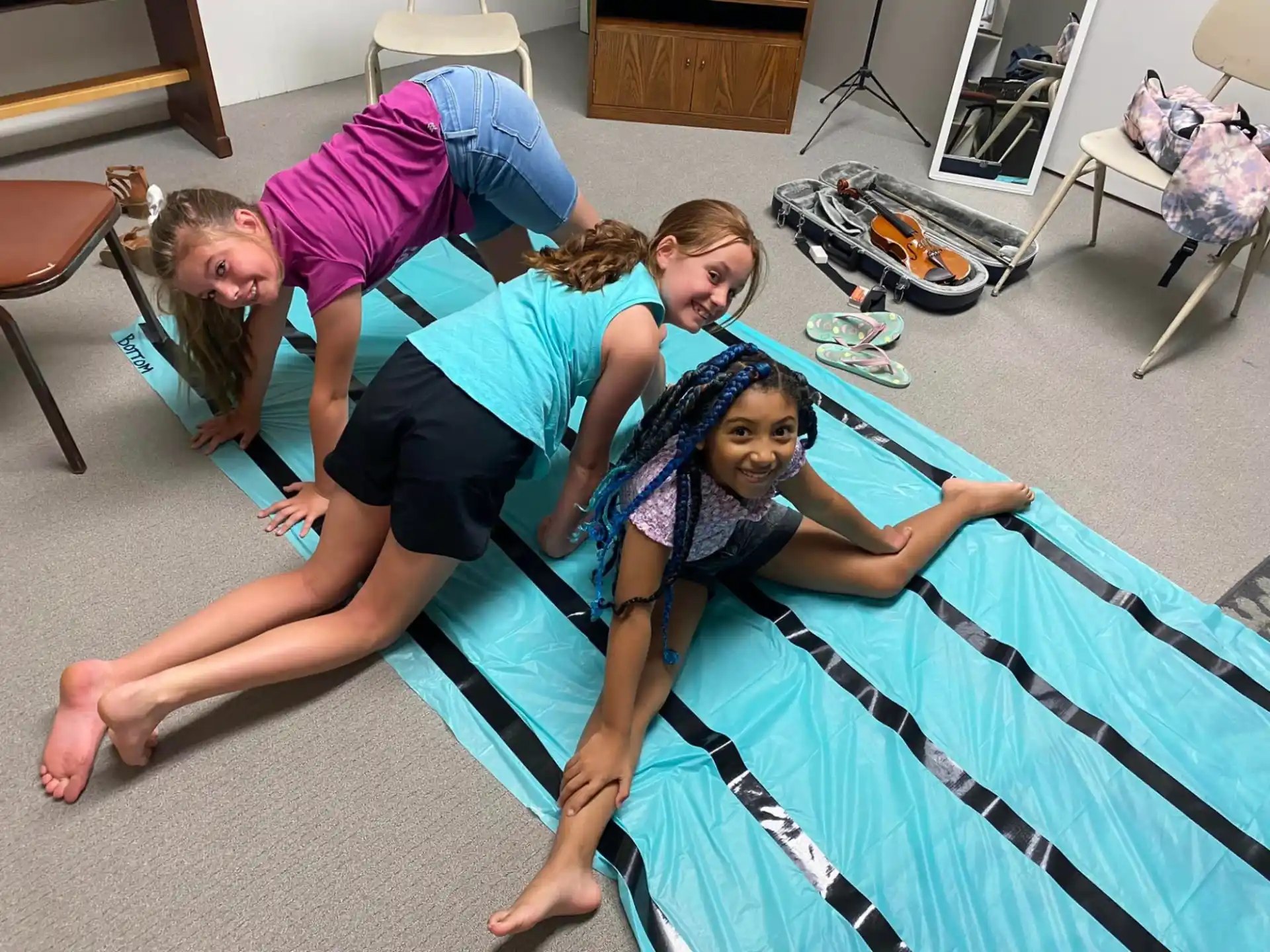 a group of women doing yoga