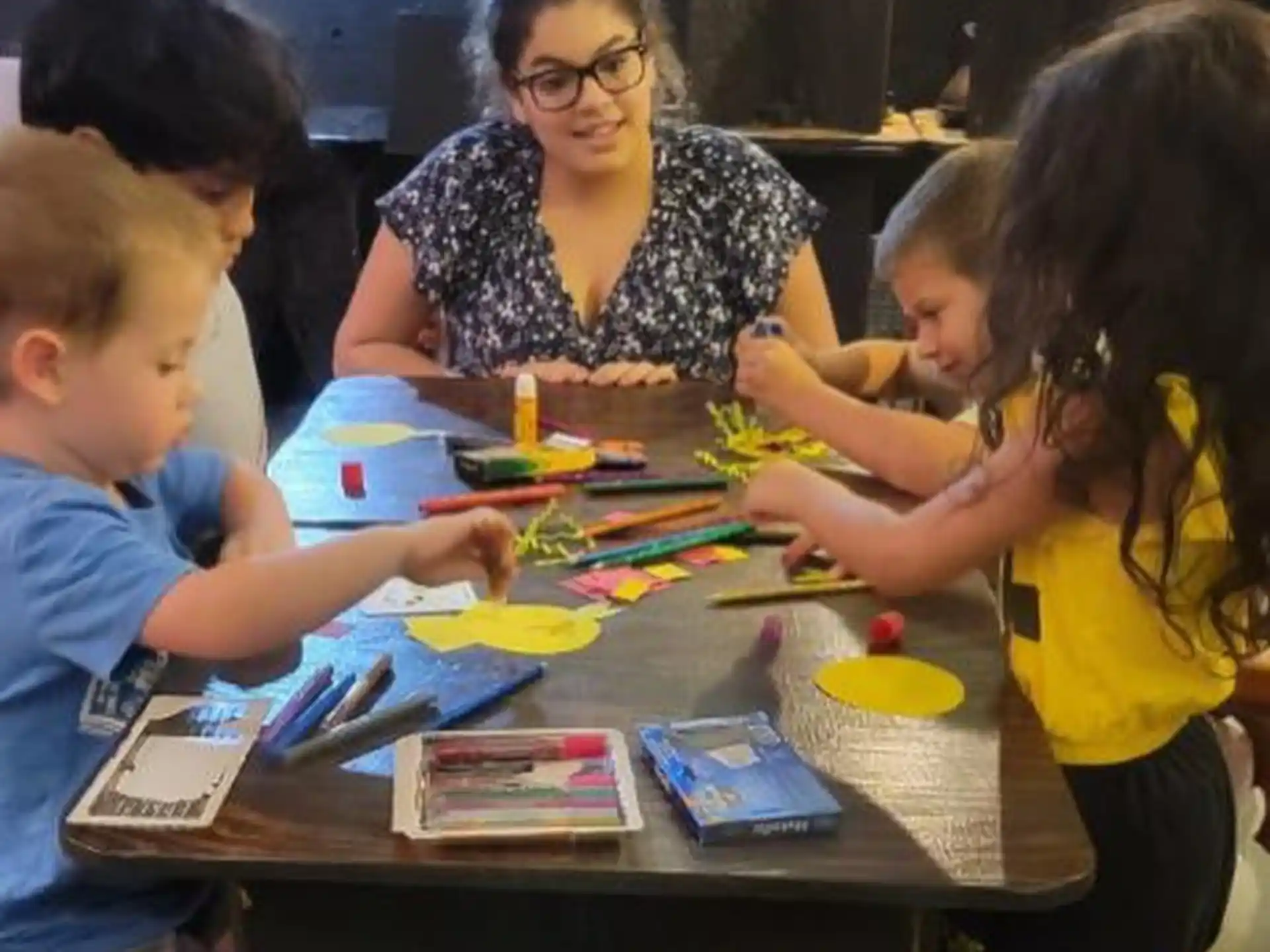 a group of children playing a board game