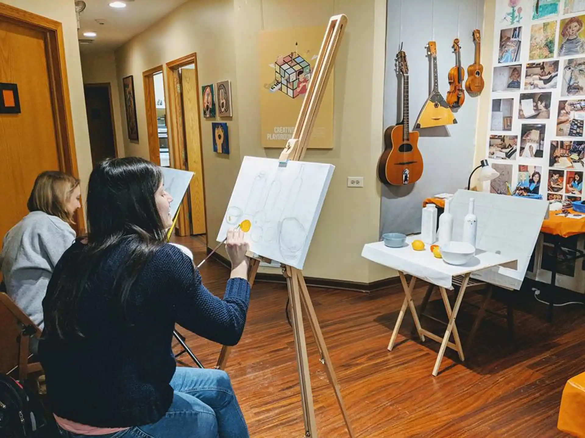 a person painting in a room