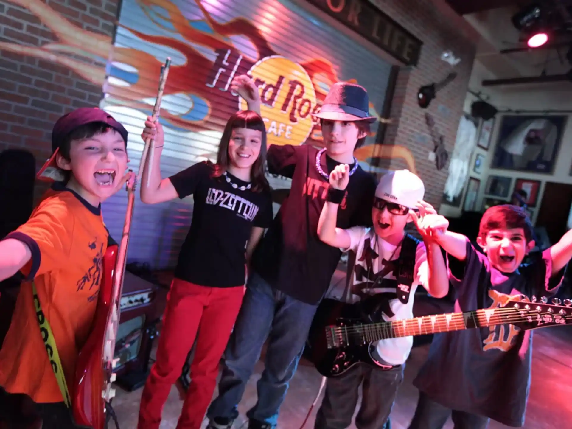 a group of people holding instruments