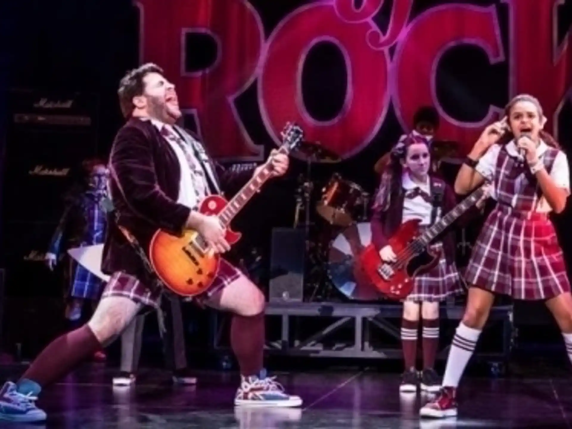 a group of people on a stage