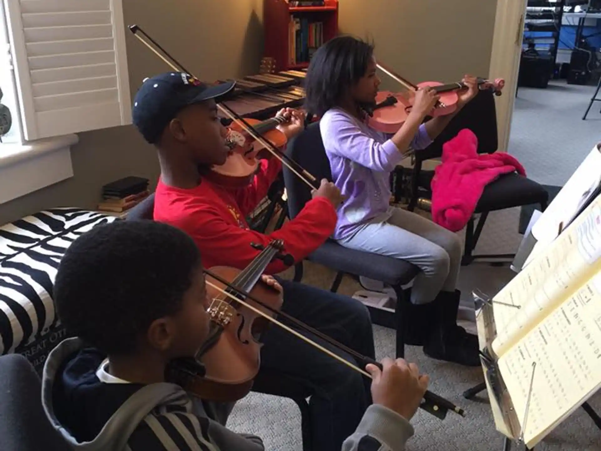 a group of people playing instruments
