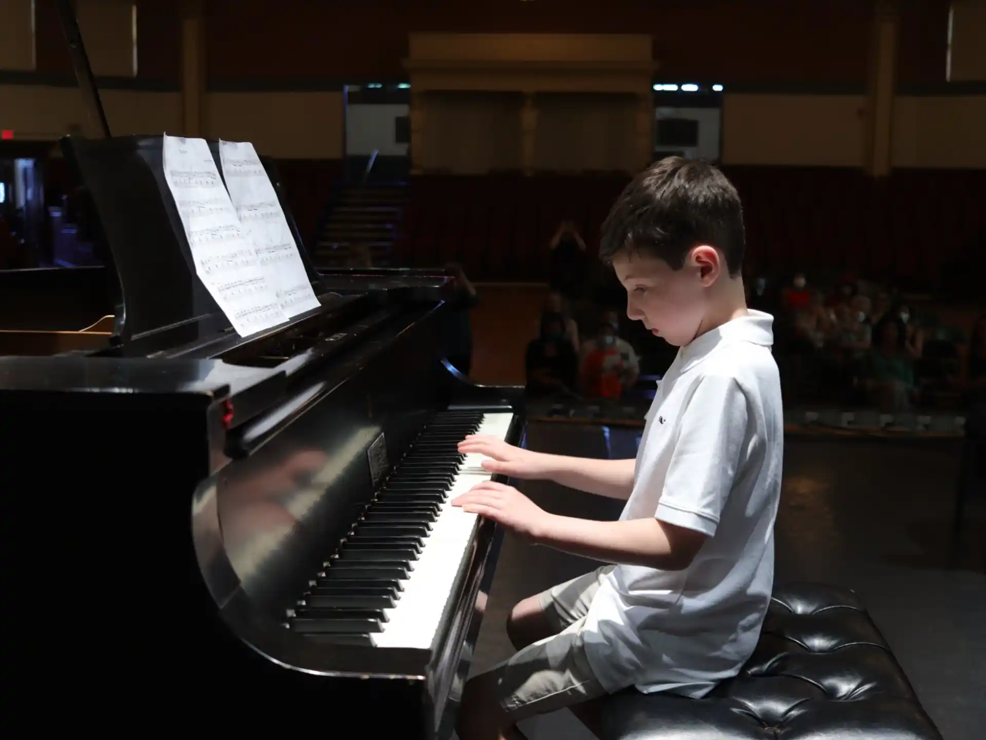 a man playing a piano