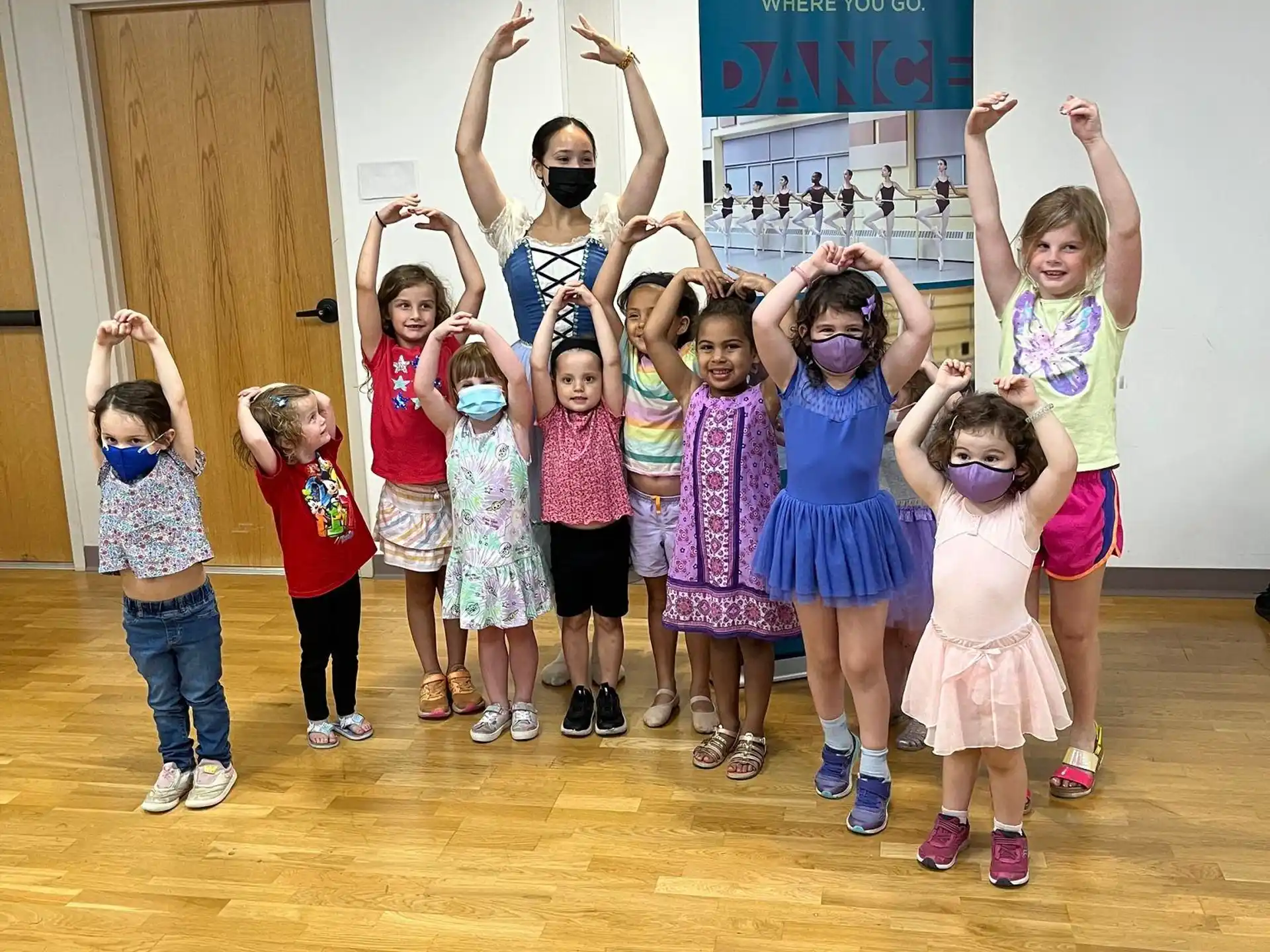 a group of children posing for a photo