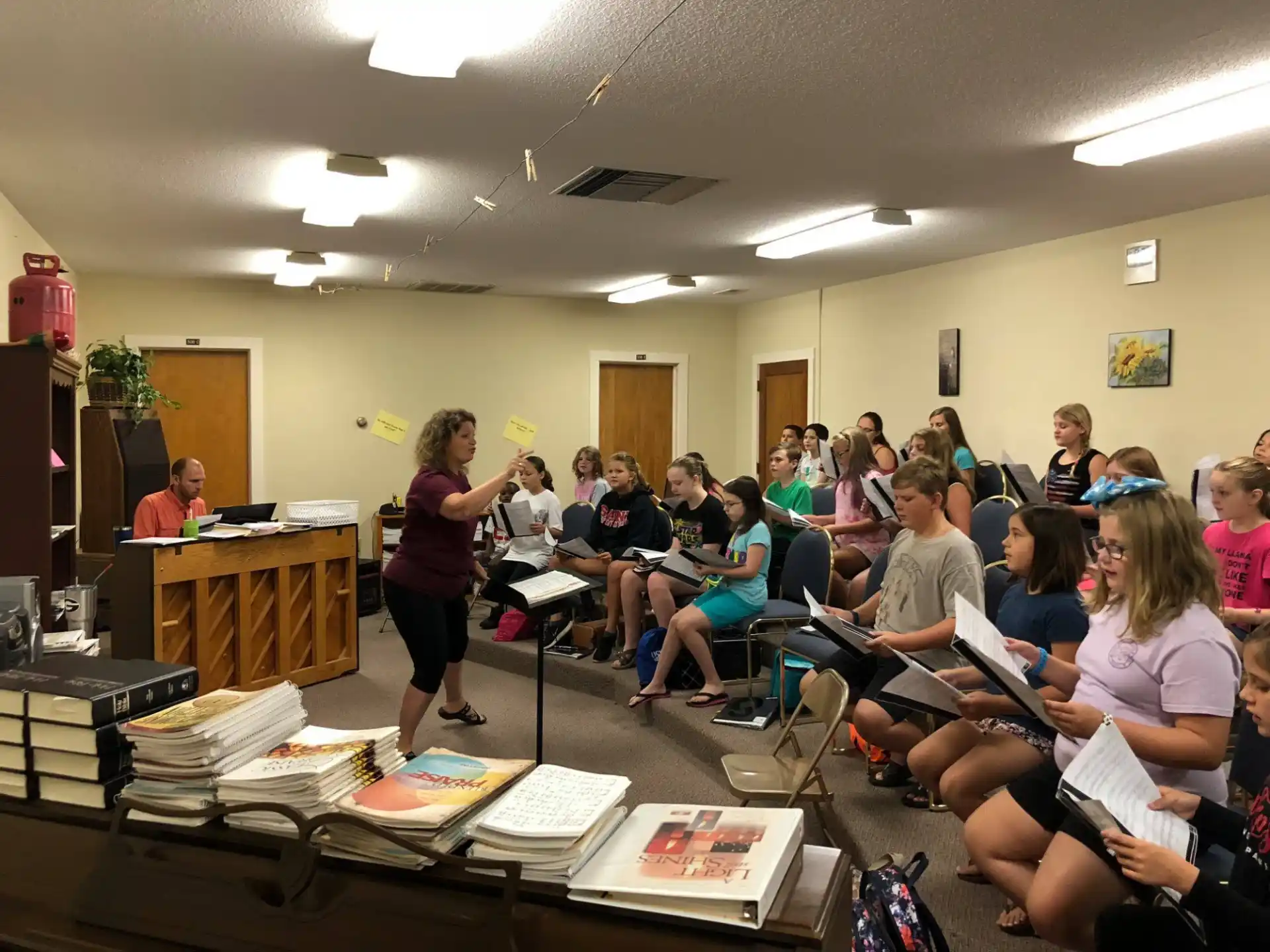 a group of people sitting in a room